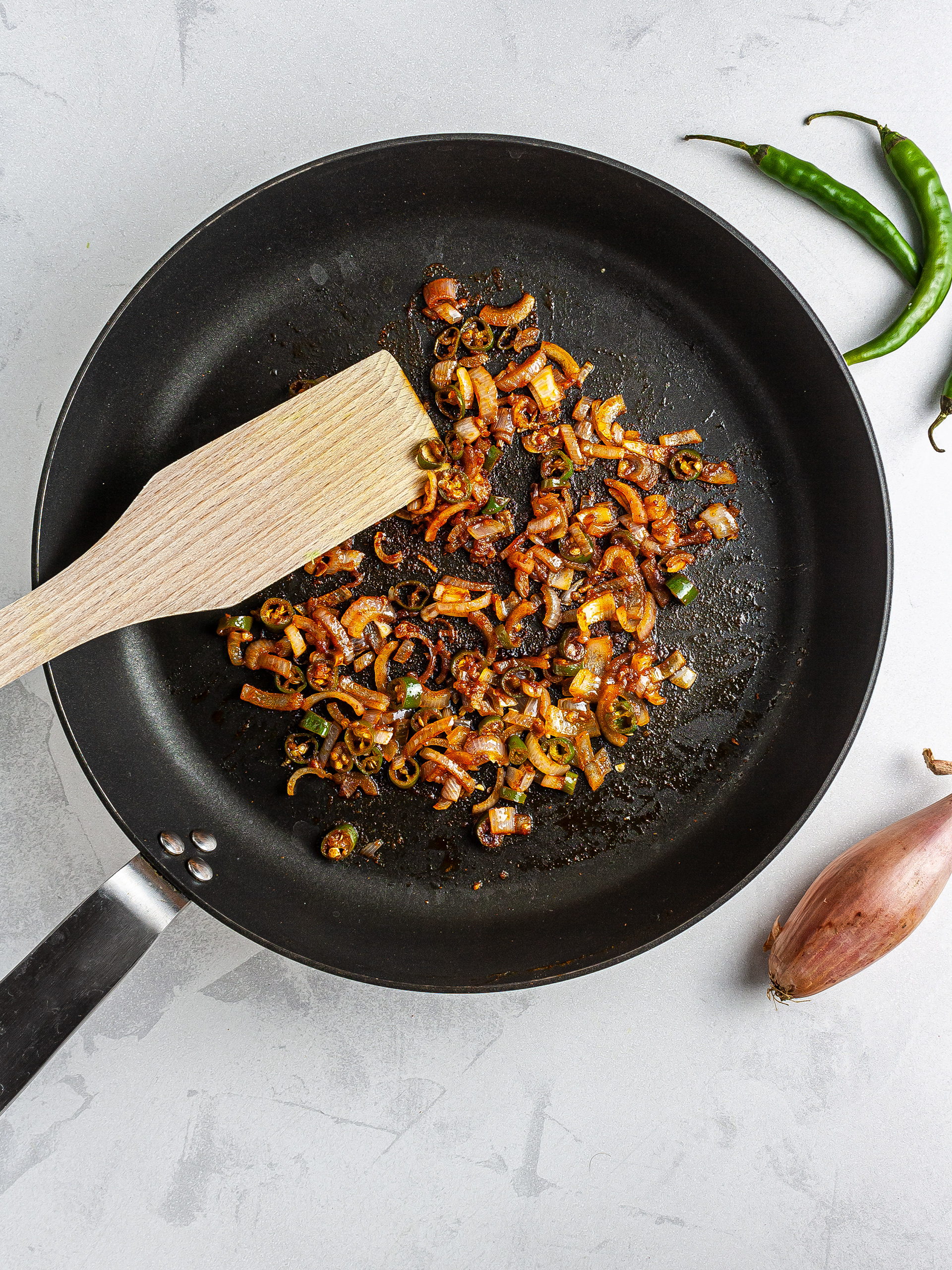 Sizzled onions, garlic, and chillies