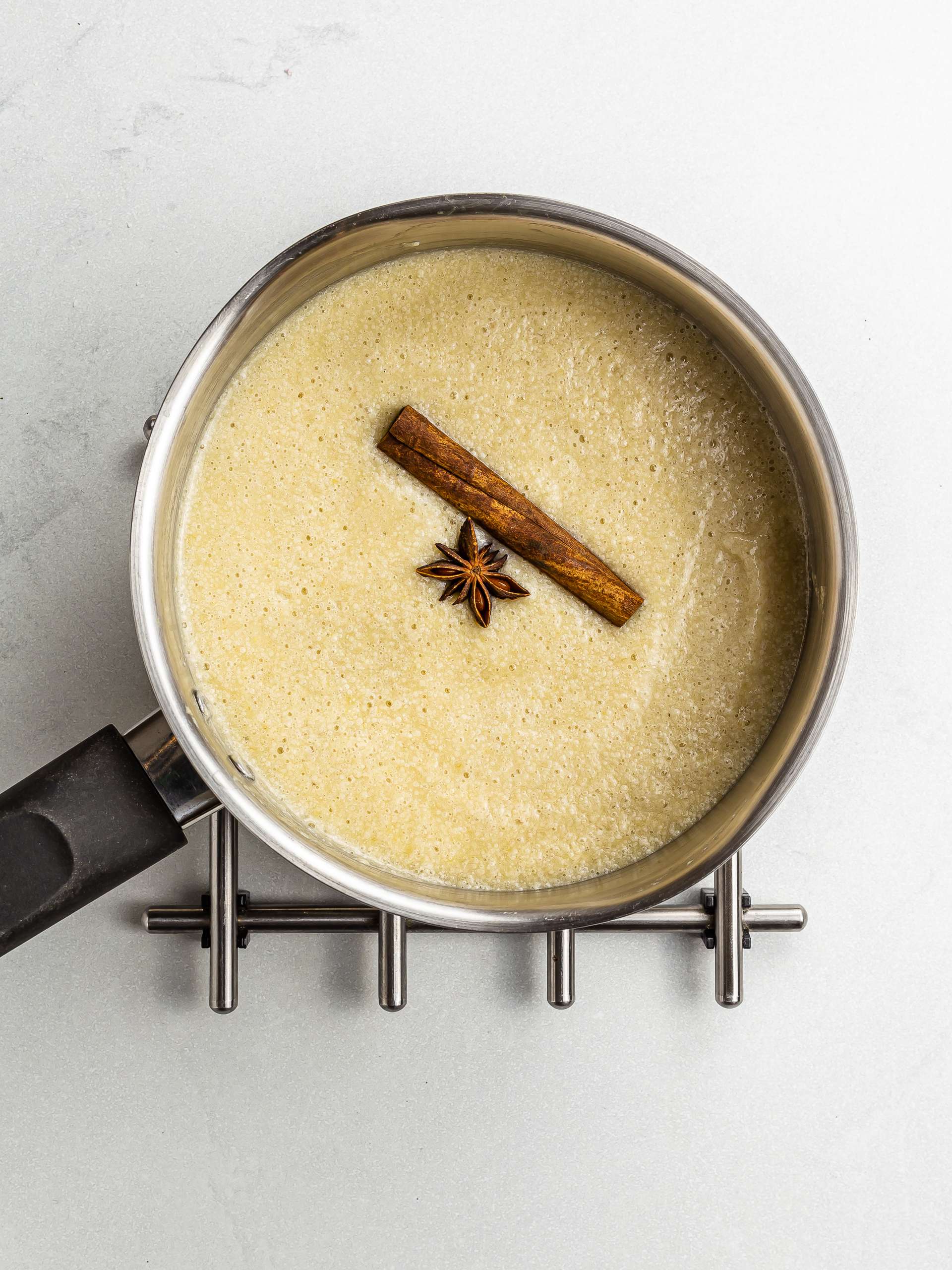 cooking plantain porridge in a pot