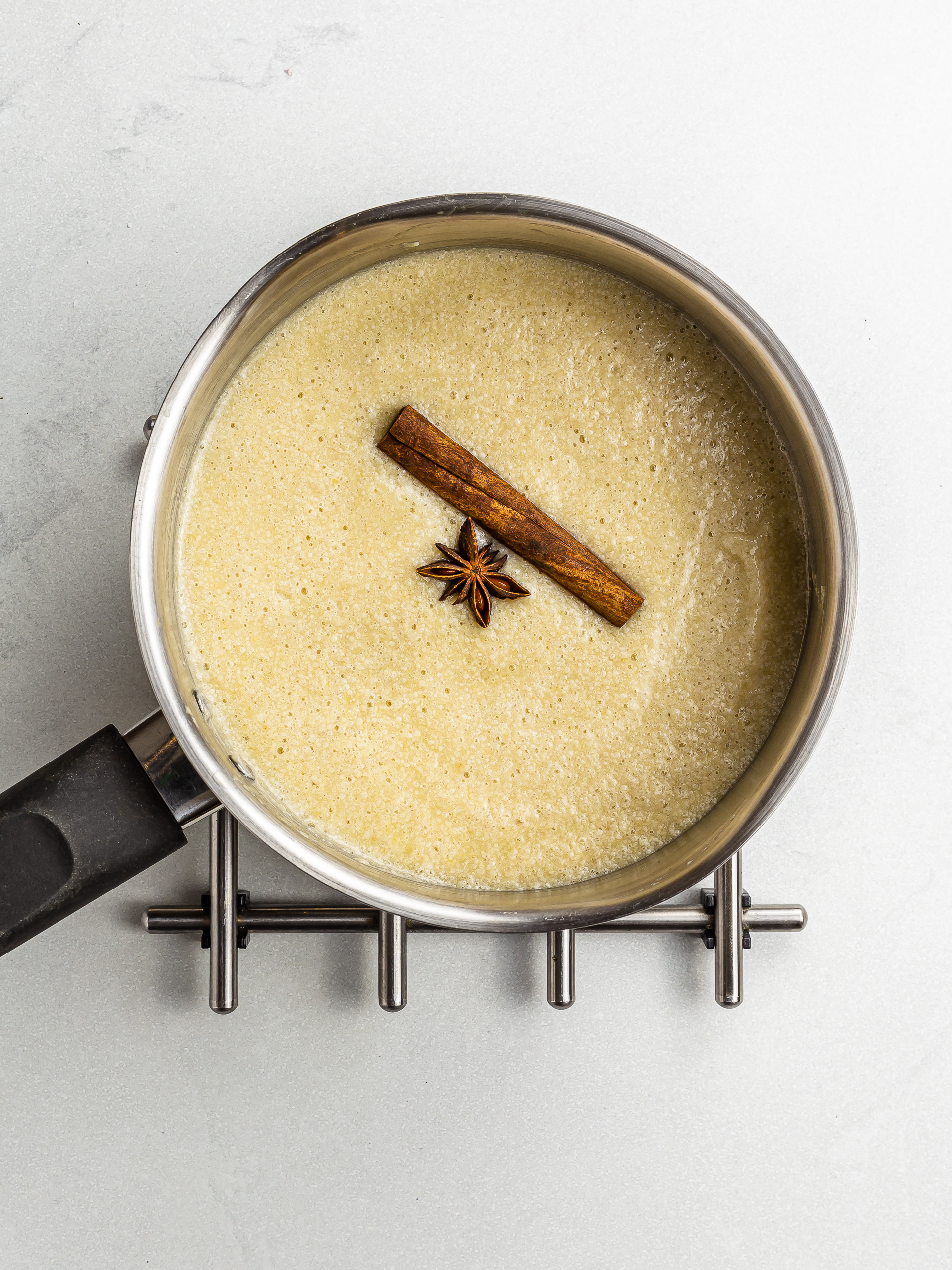 cooking plantain porridge in a pot