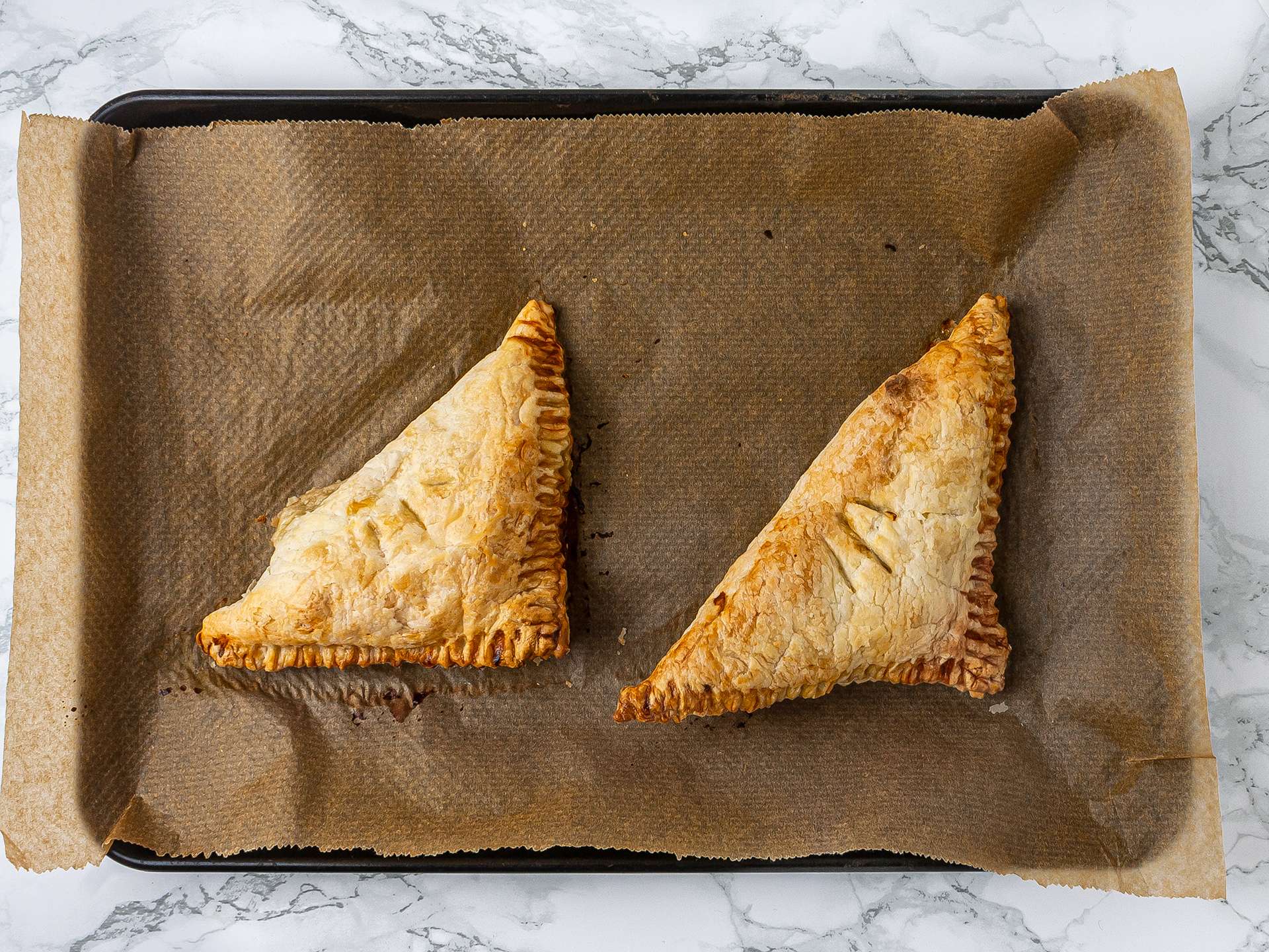 Crispy gluten-free pear turnover with dates pastries baked in the oven