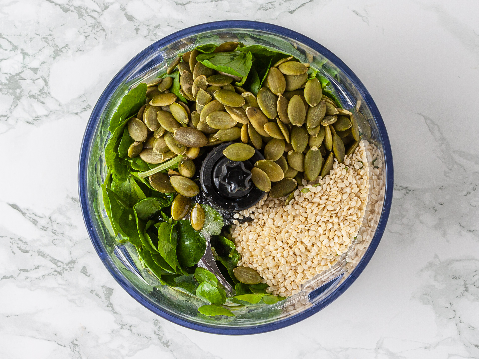 watercress, sunflower seeds, sesame seeds, lemon juice, and oil in a food processor to make pesto