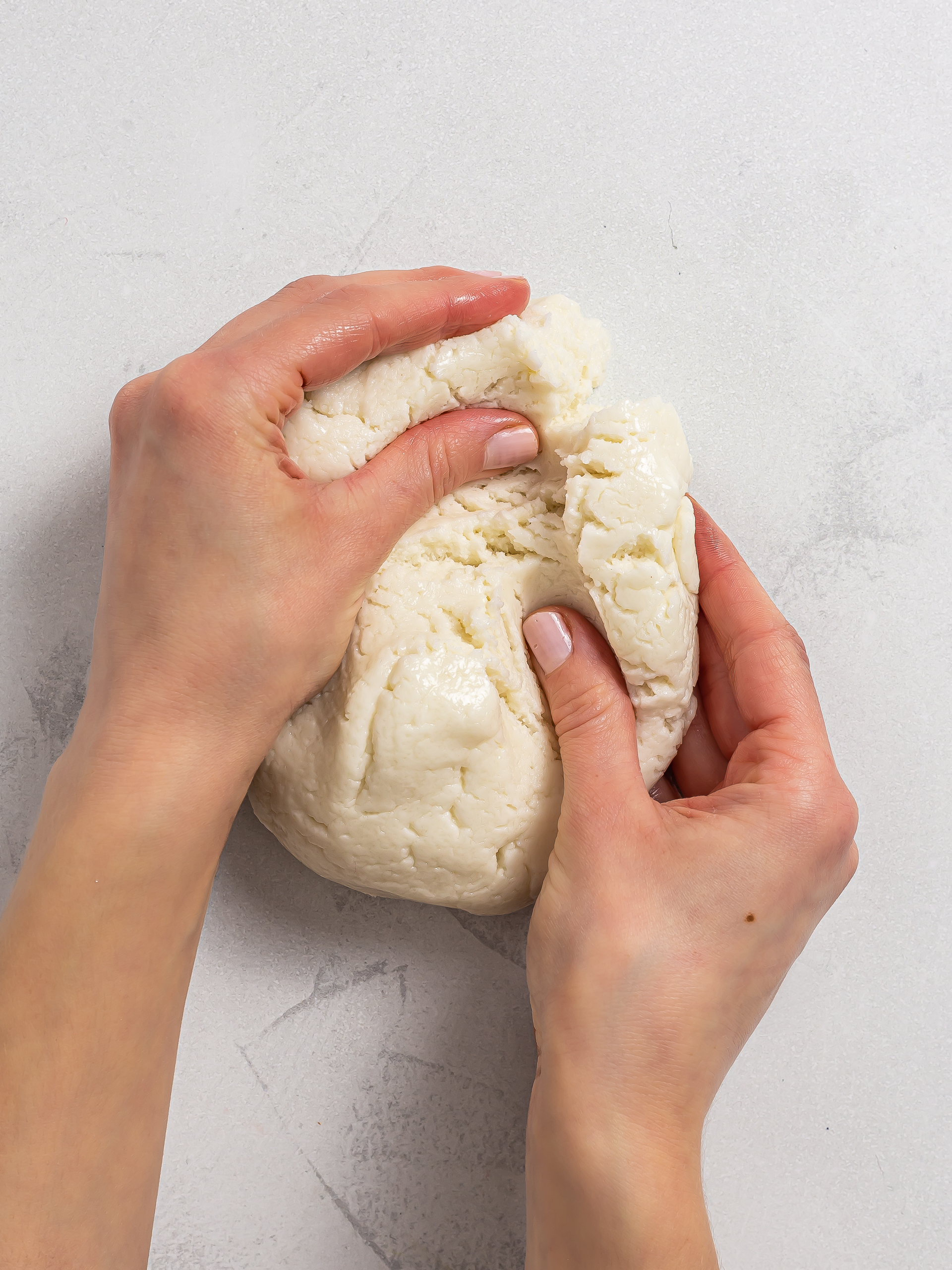 woman kneading mochi cookie dough