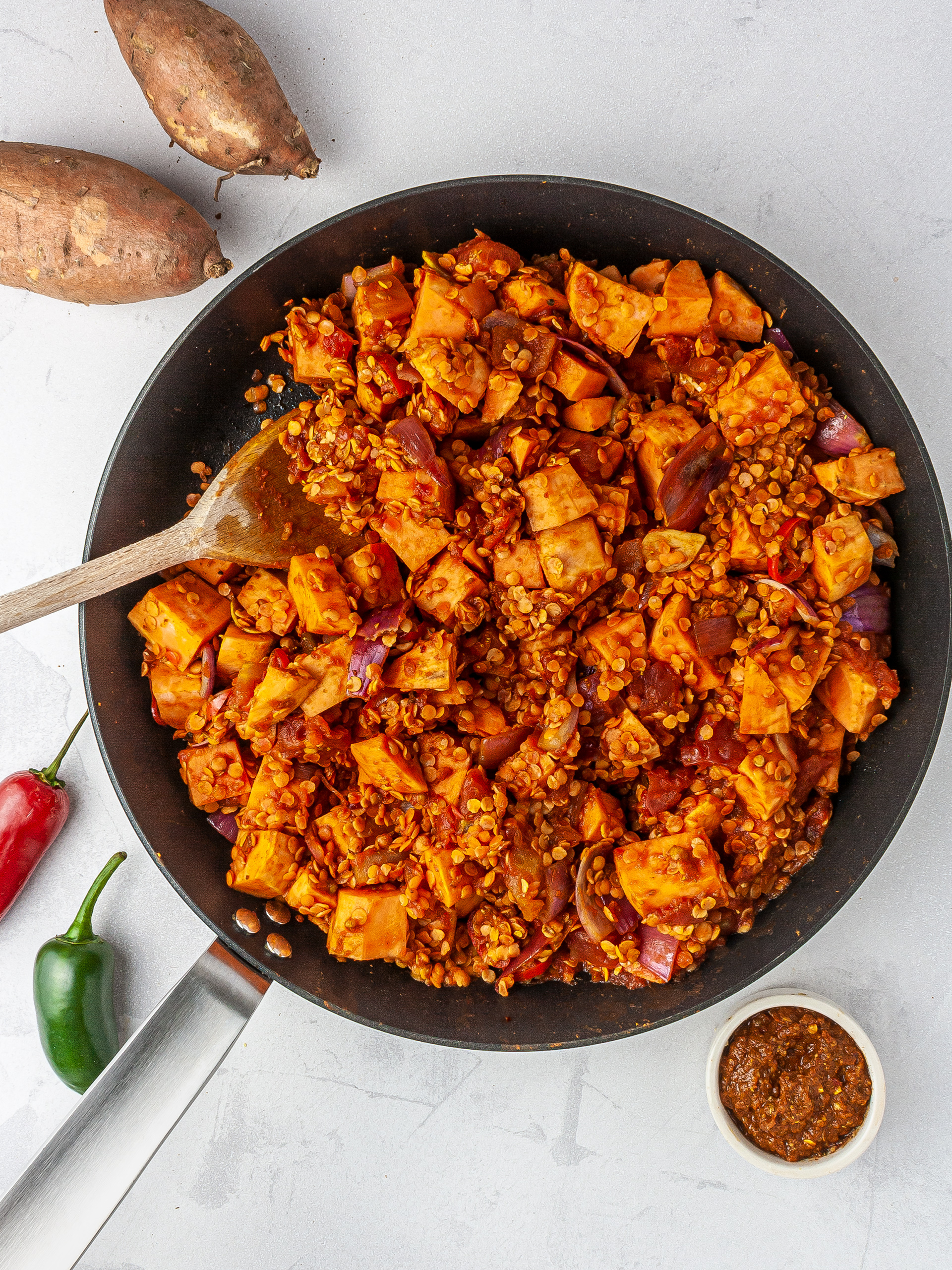 Sweet potatoes, red lentils, and tomato sauce in the curry.