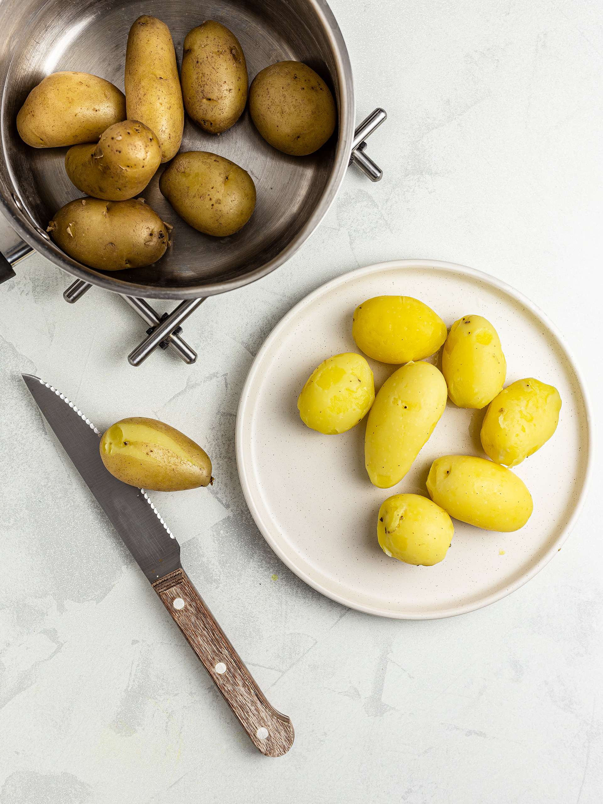 boiled and peeled baby potatoes