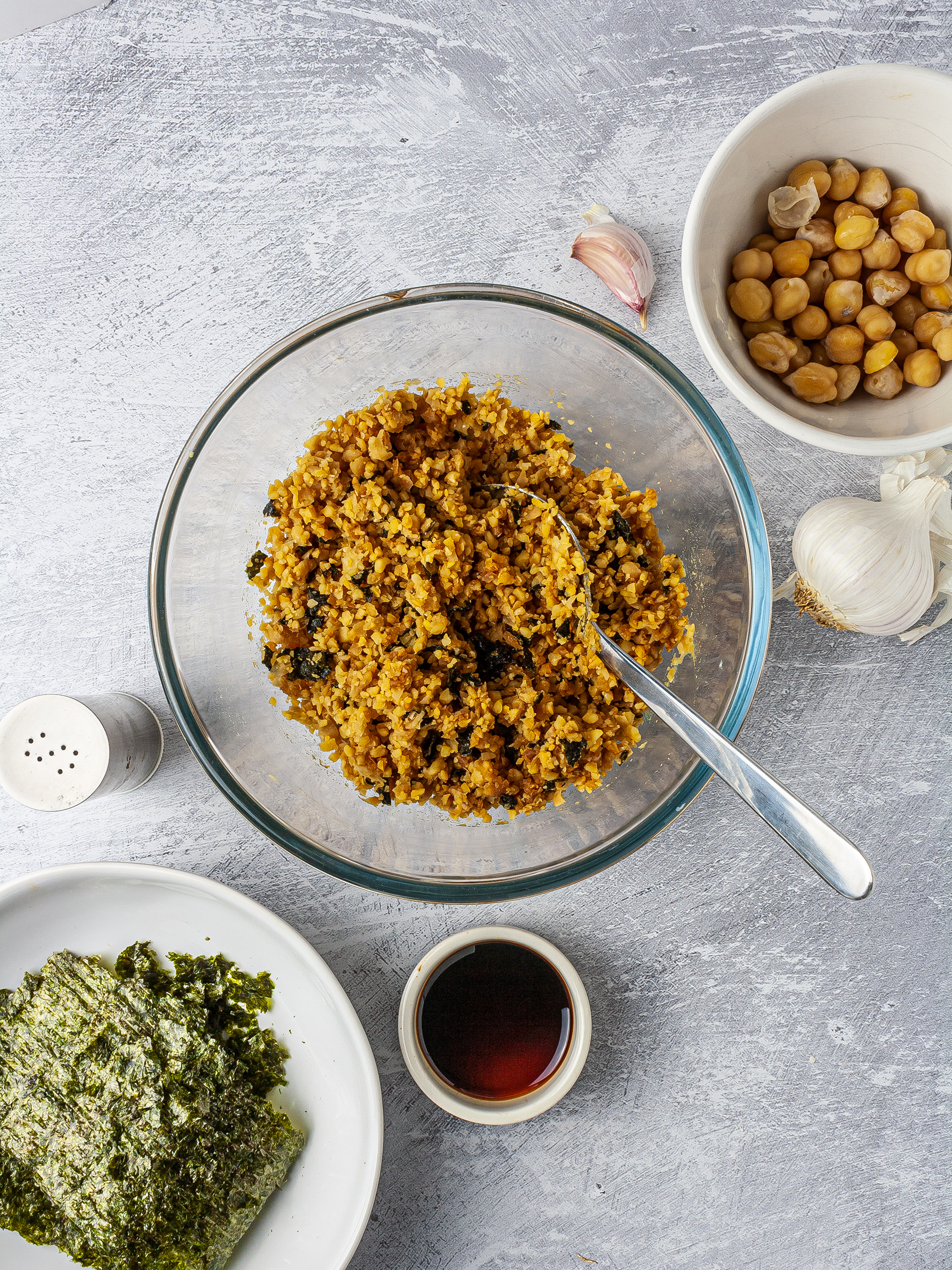 Vegan tuna filling for the onigiri made with chickpeas, nori sheets, soy sauce, garlic, and rice vinegar.