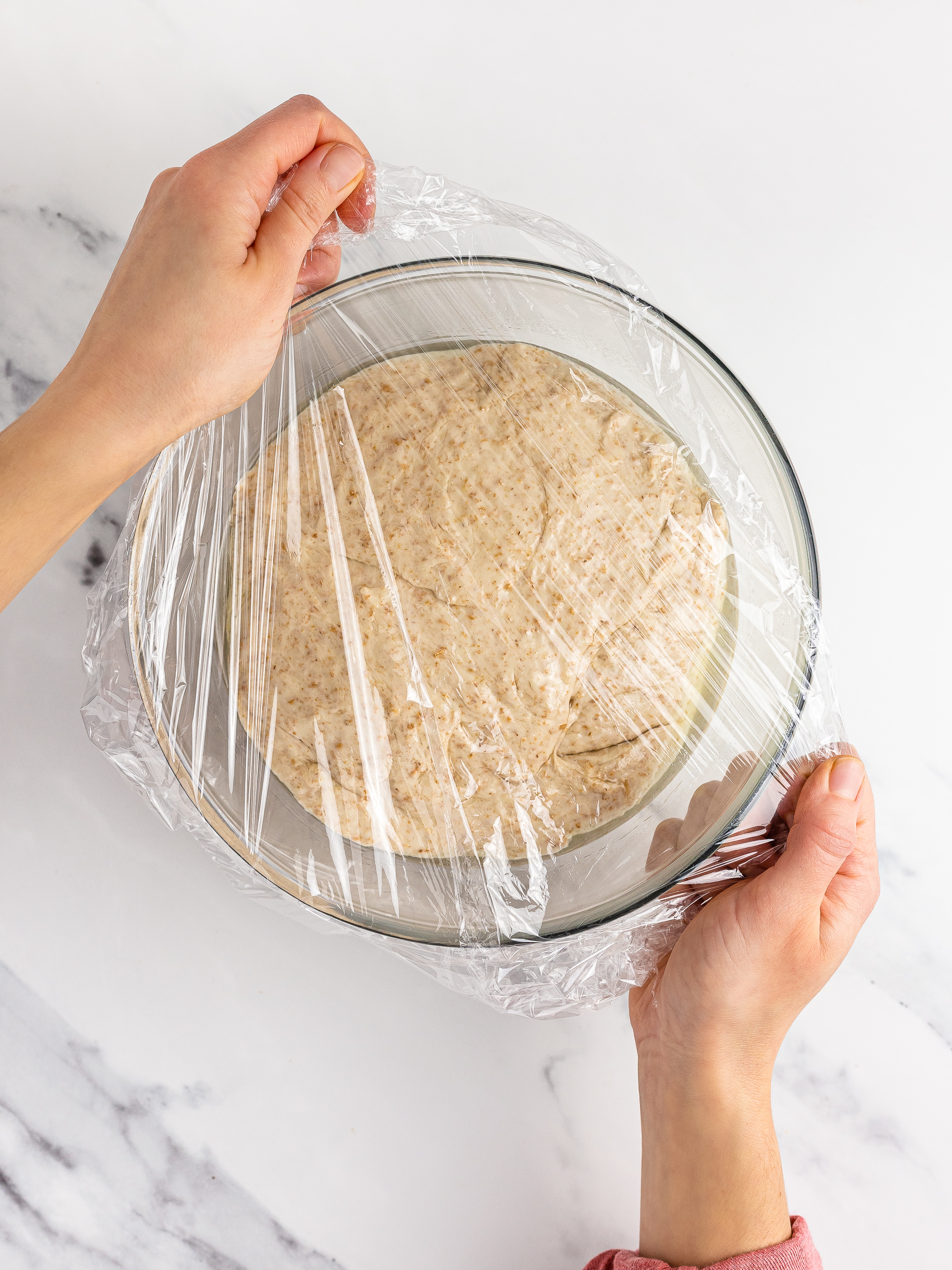 Hawaiian dough in a bowl covered with cling film