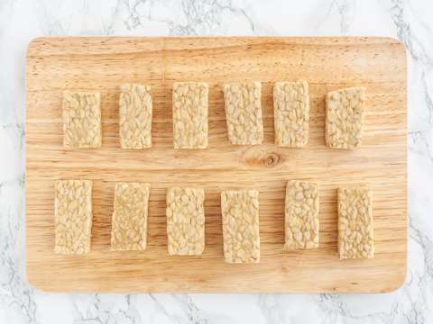 Tempeh on a chopping board