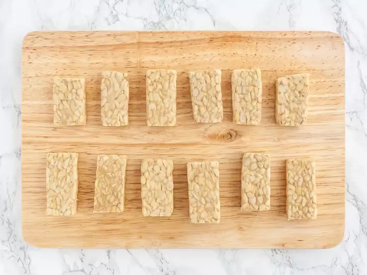 Tempeh on a chopping board