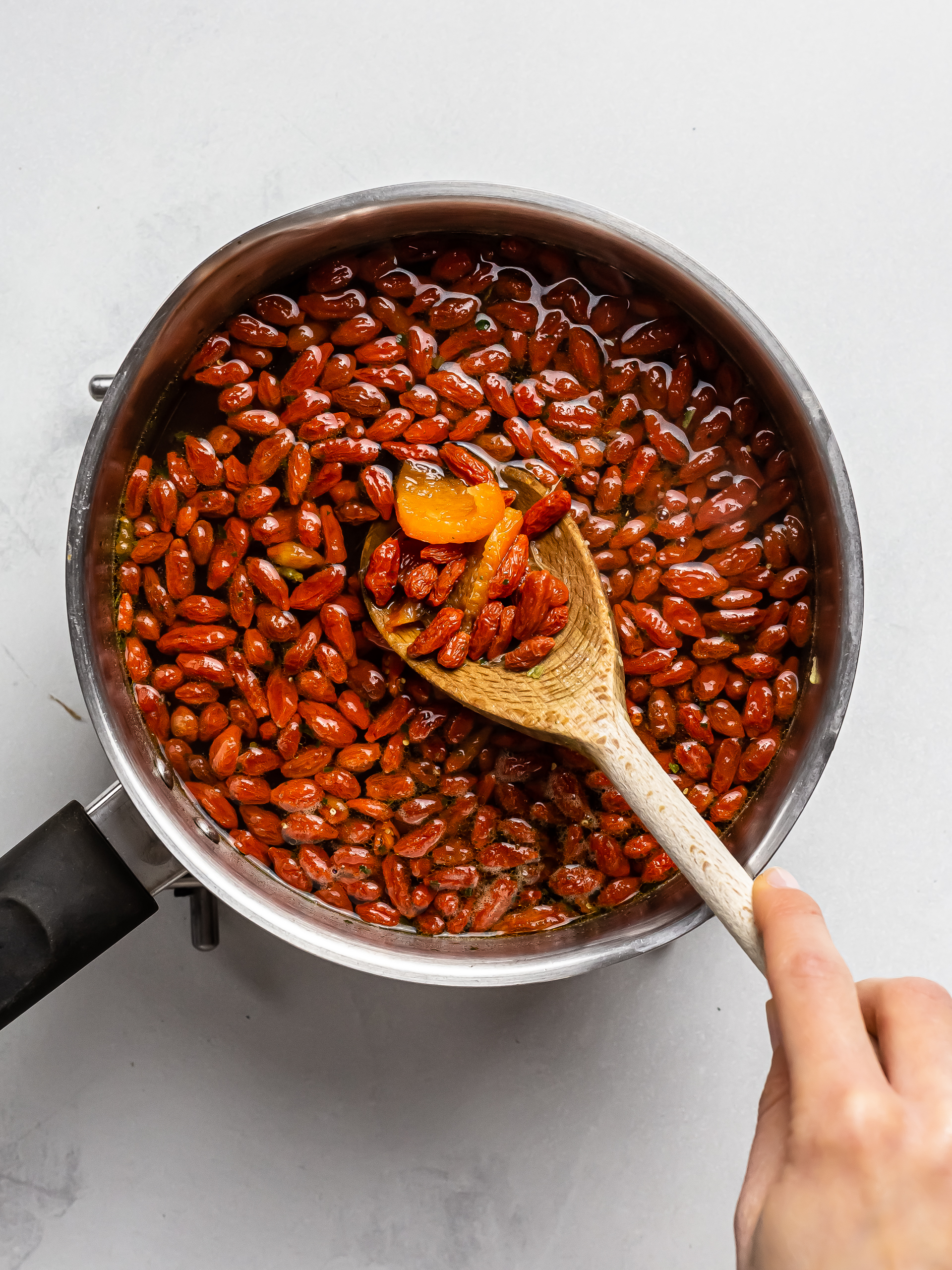 goji berries cooking in a soup