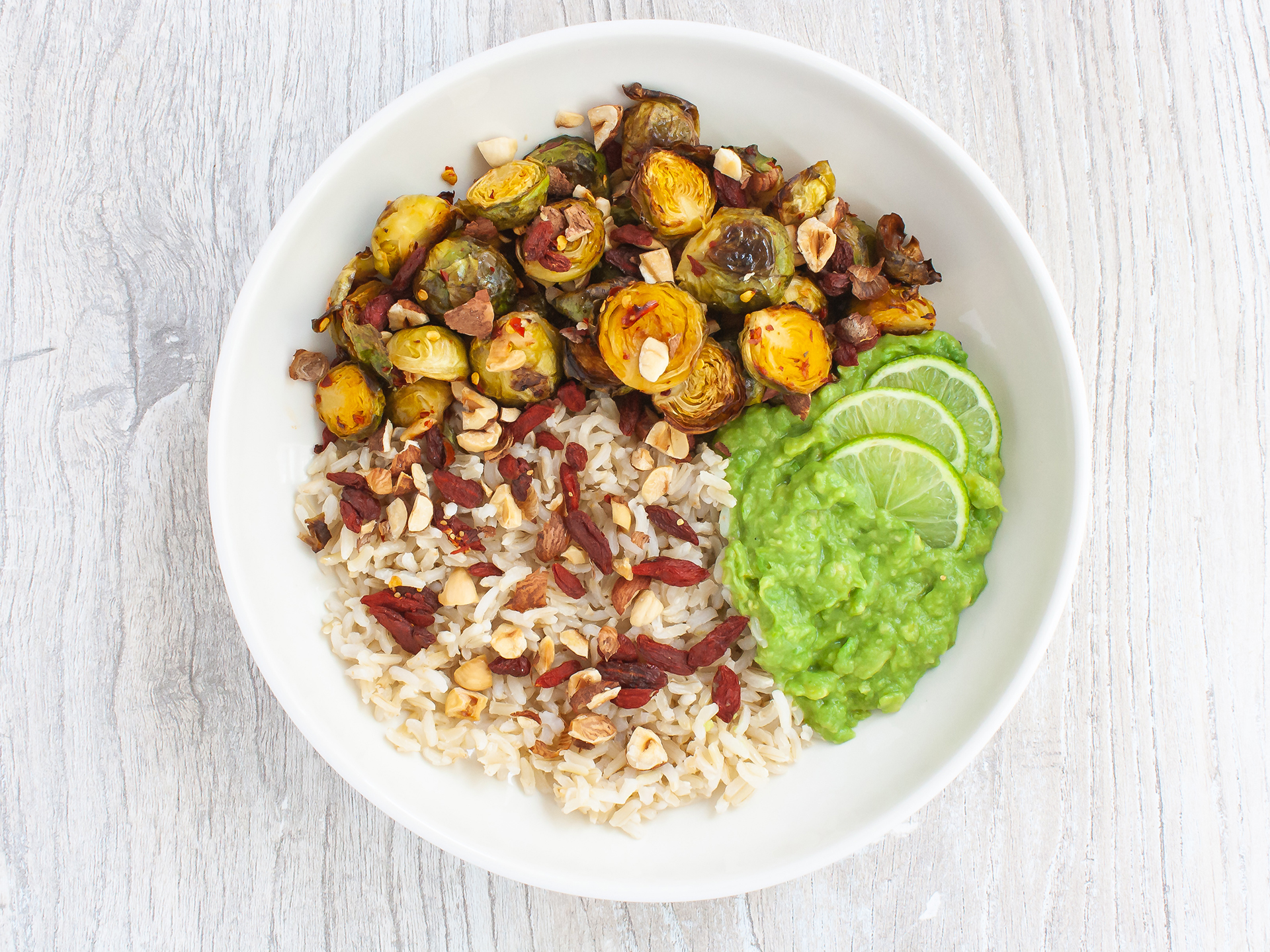 chilli lime brussel sprouts bowl with avocado dressing