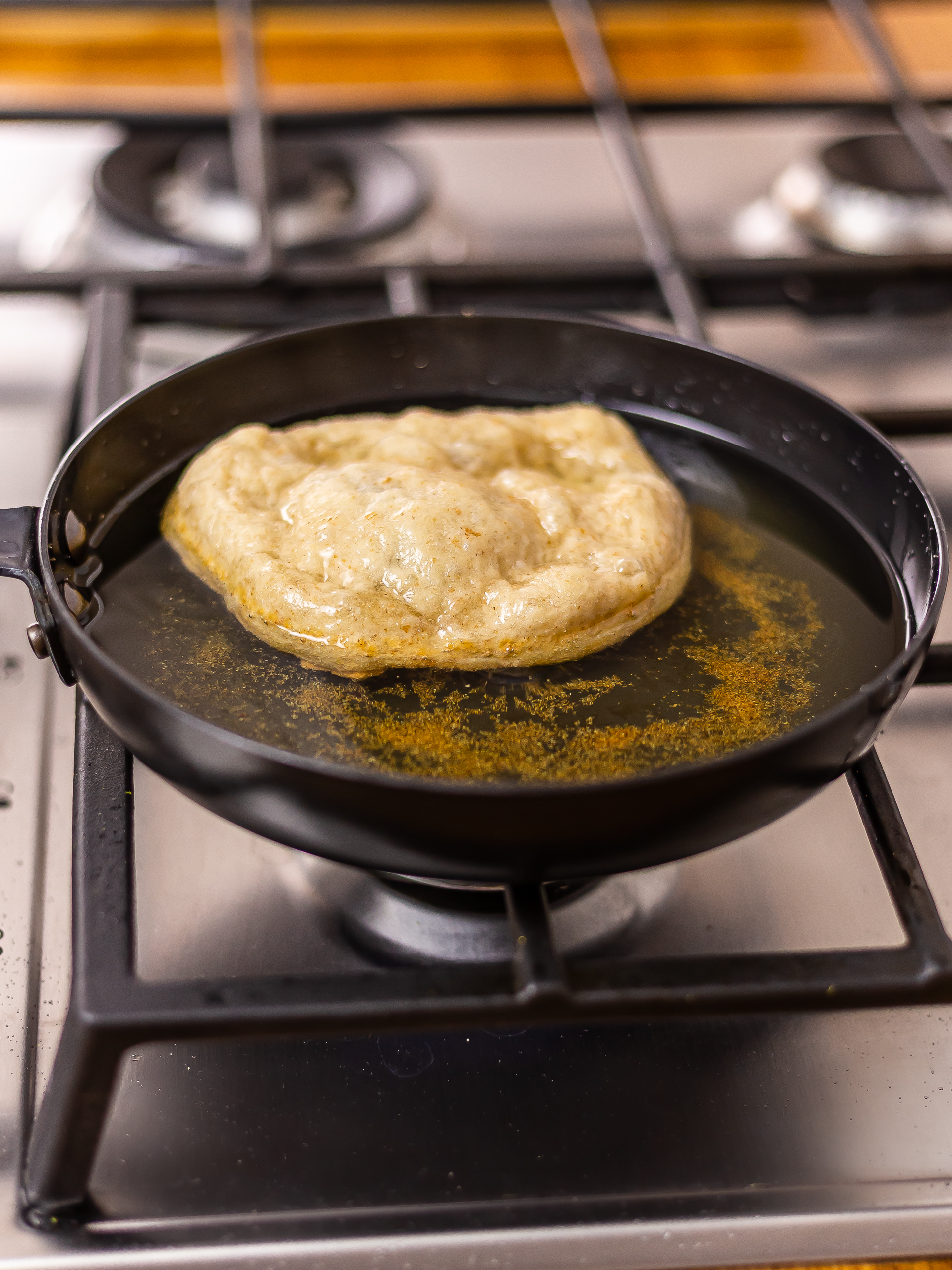 sourdough fry bread cooking frying in a skillet