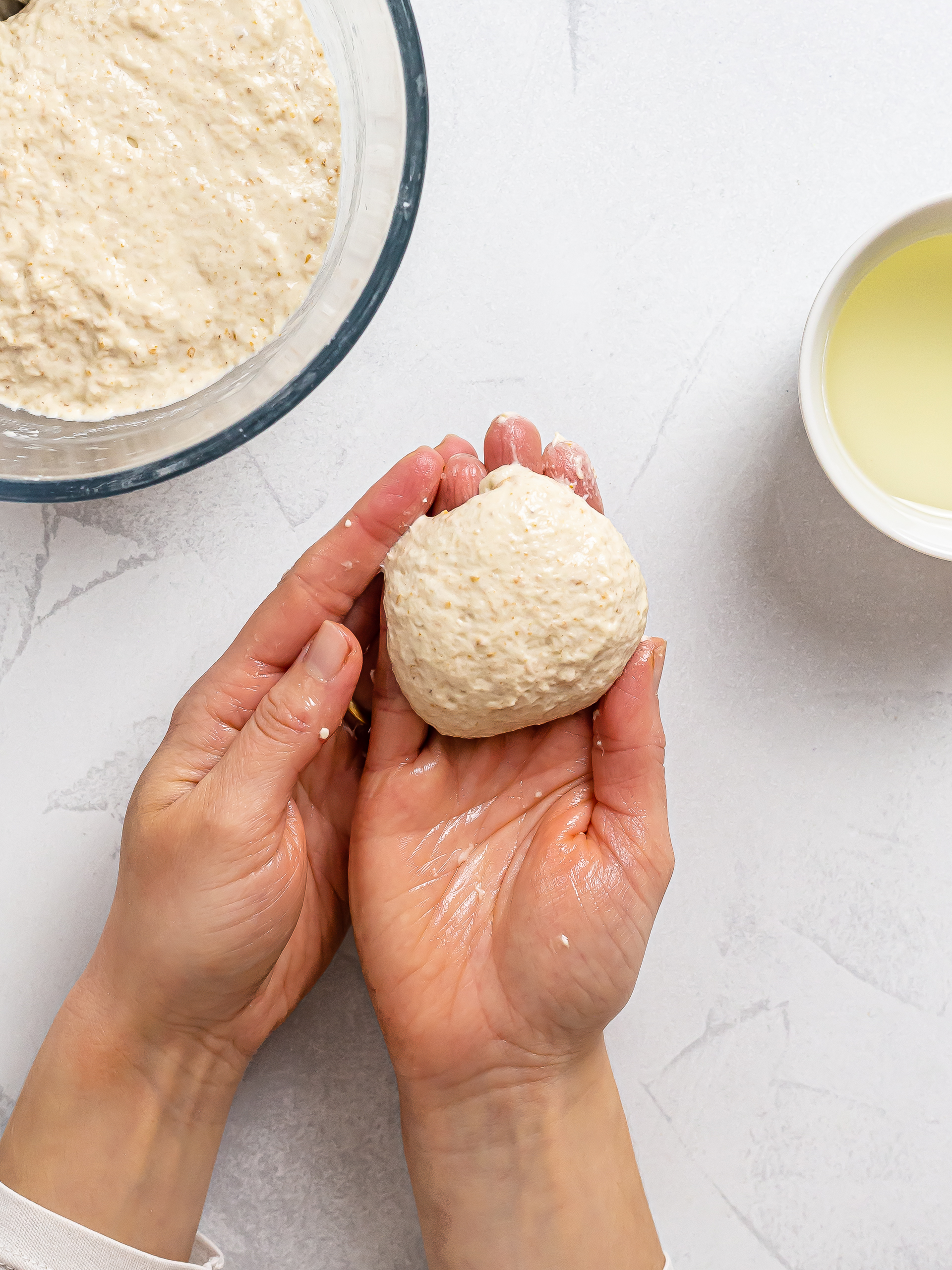 woman shaping fry bread dough ball