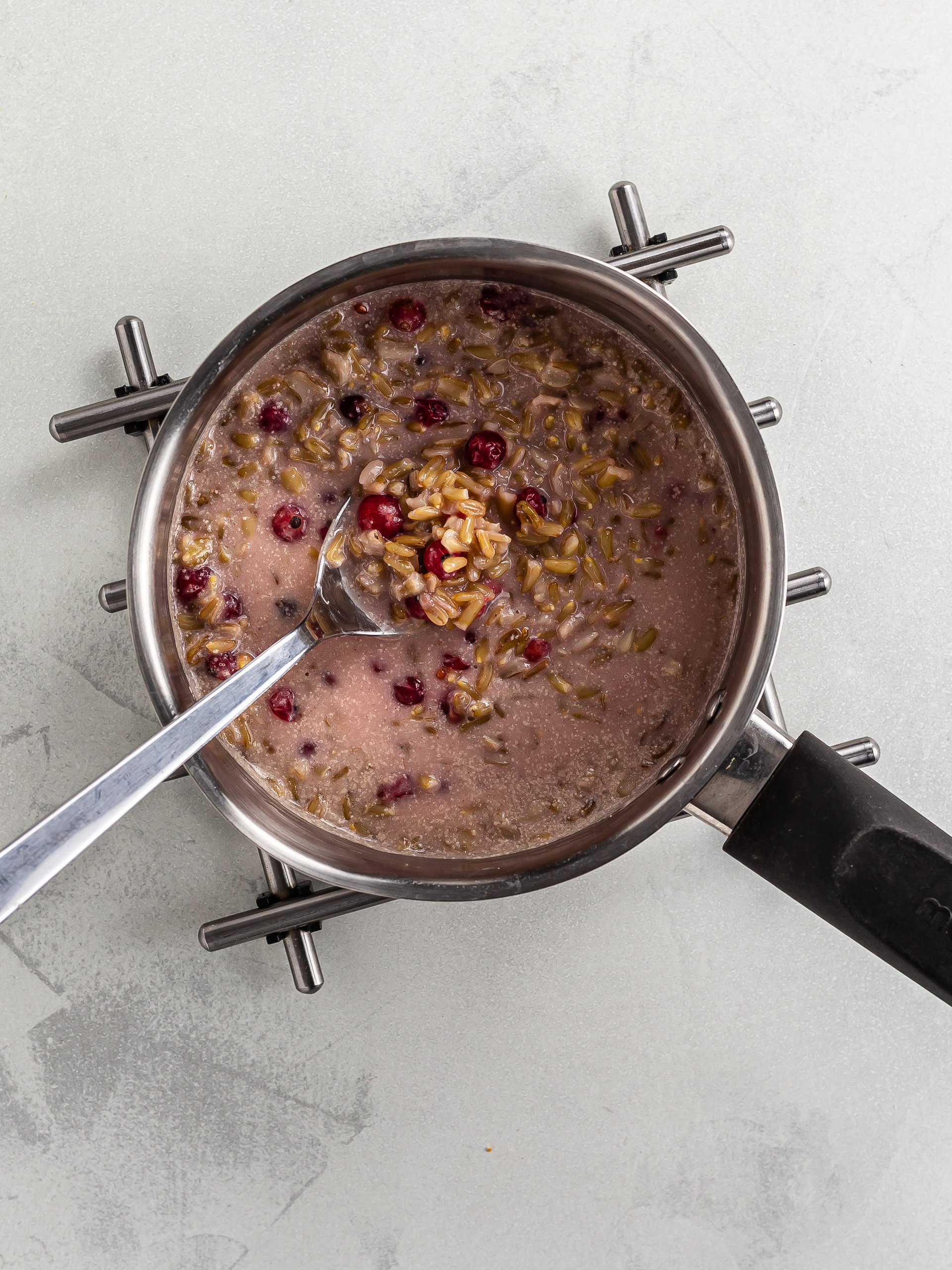 oat groats porridge with red currant berries