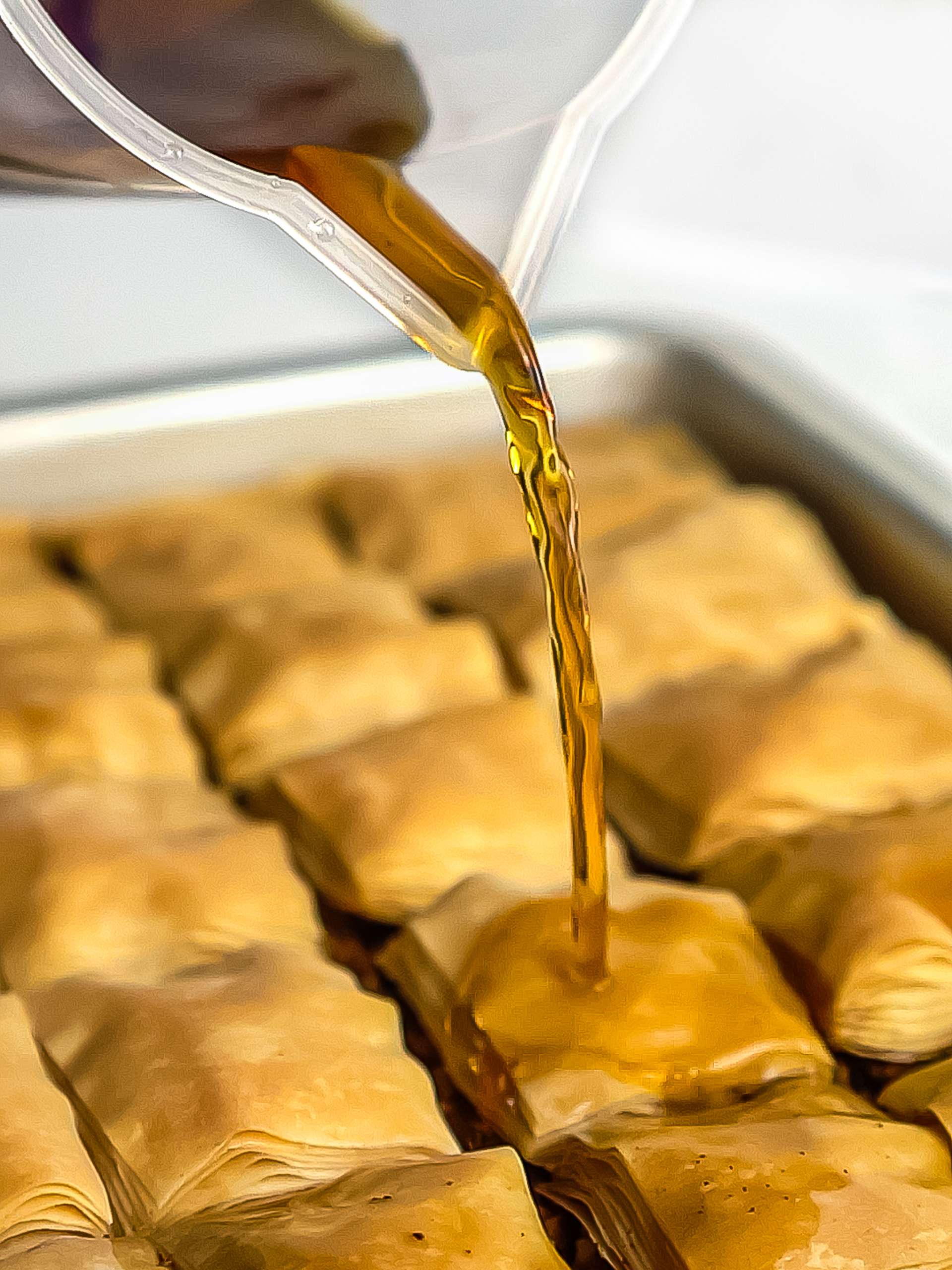 baklava drizzled with maple syrup
