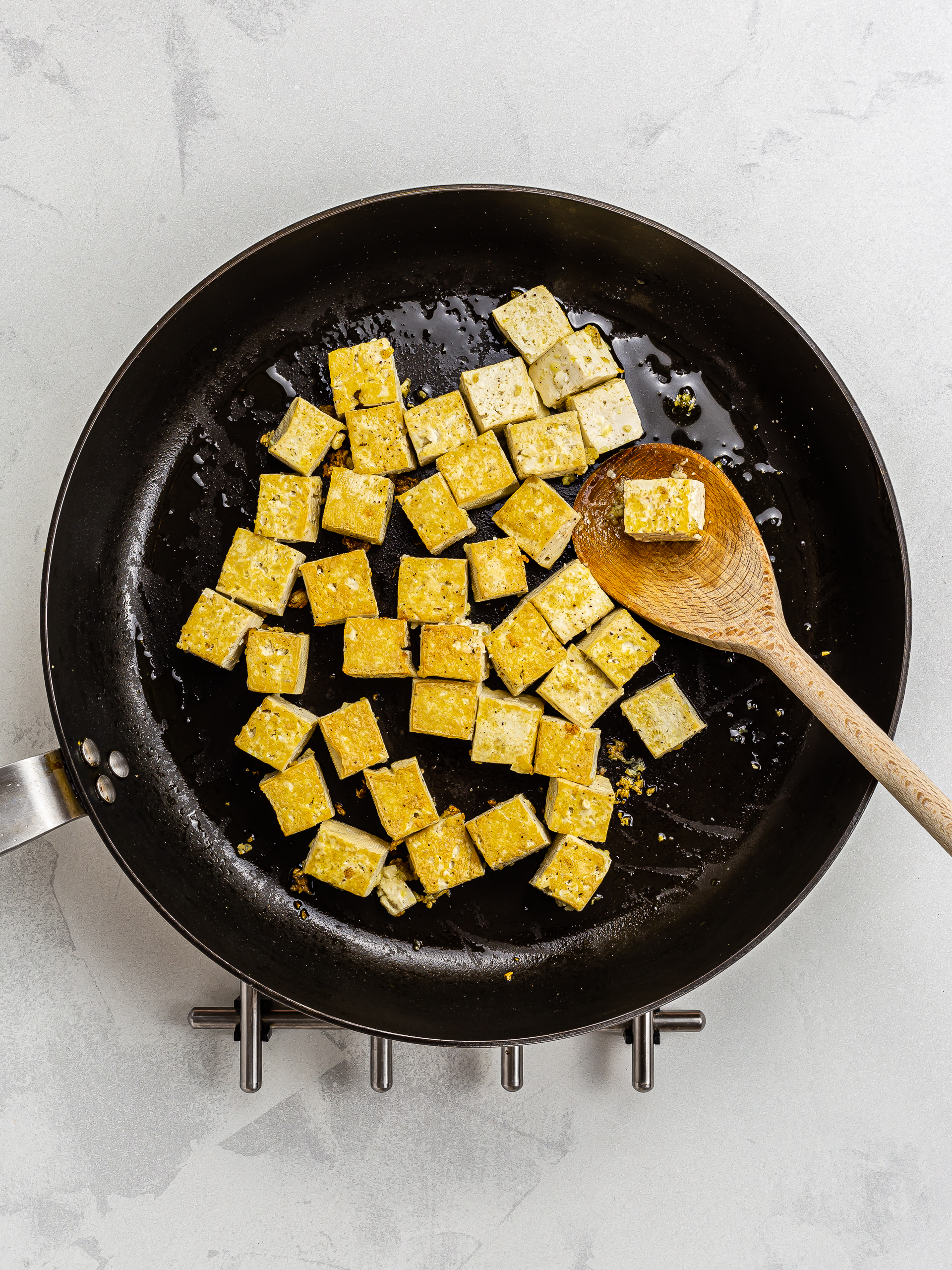sizzled tofu in a skillet