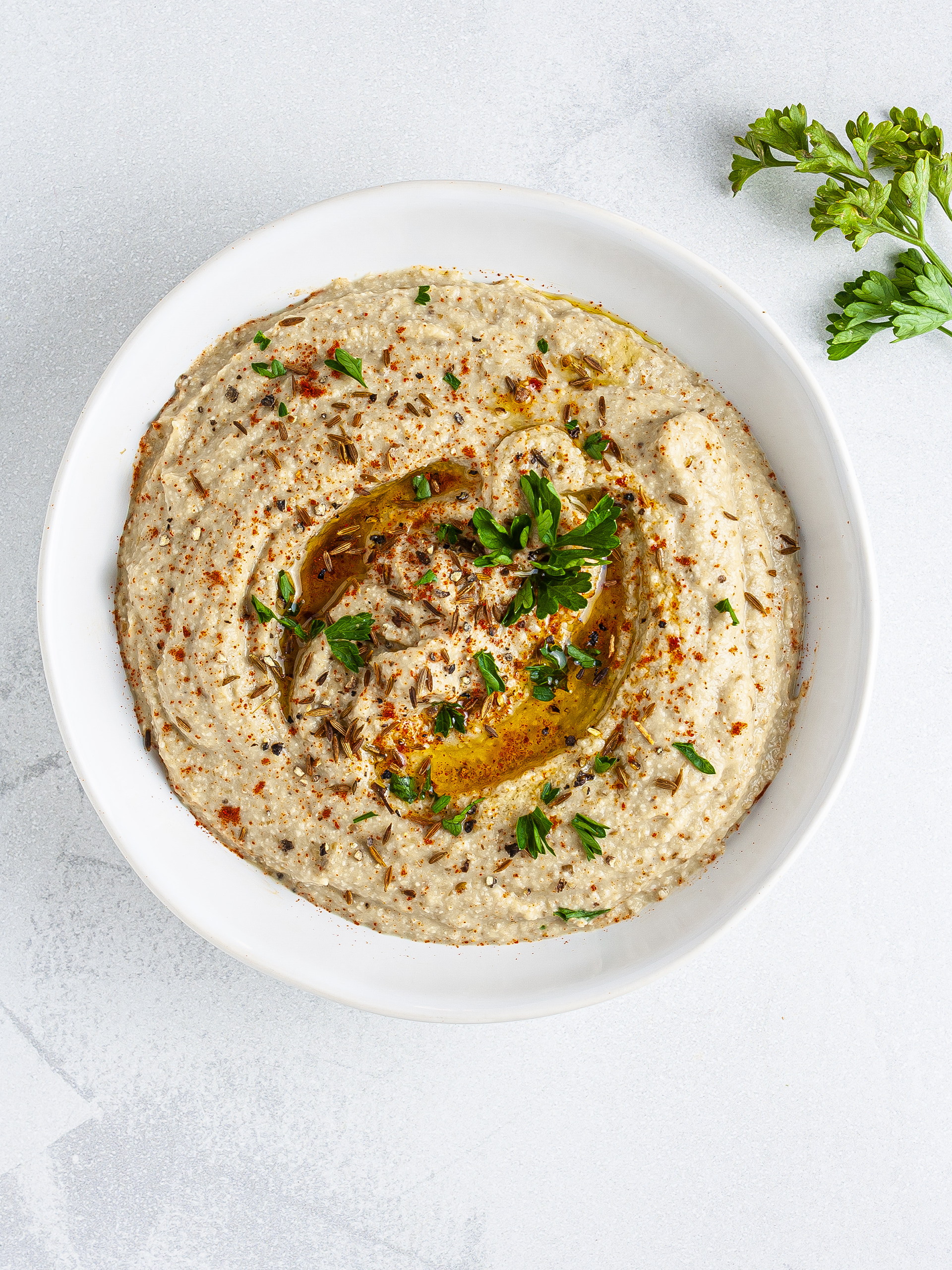 Baba ganoush topped with paprika and cumin seeds