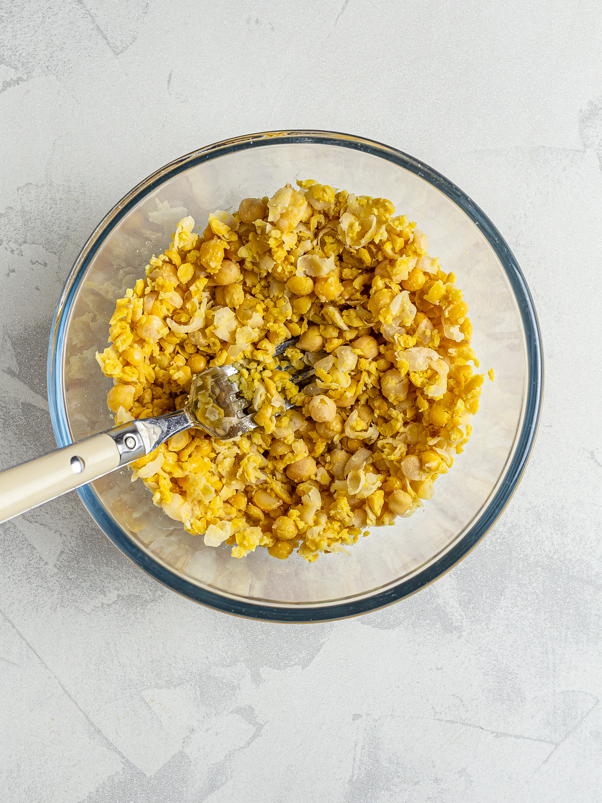 Smashed chickpeas in a bowl