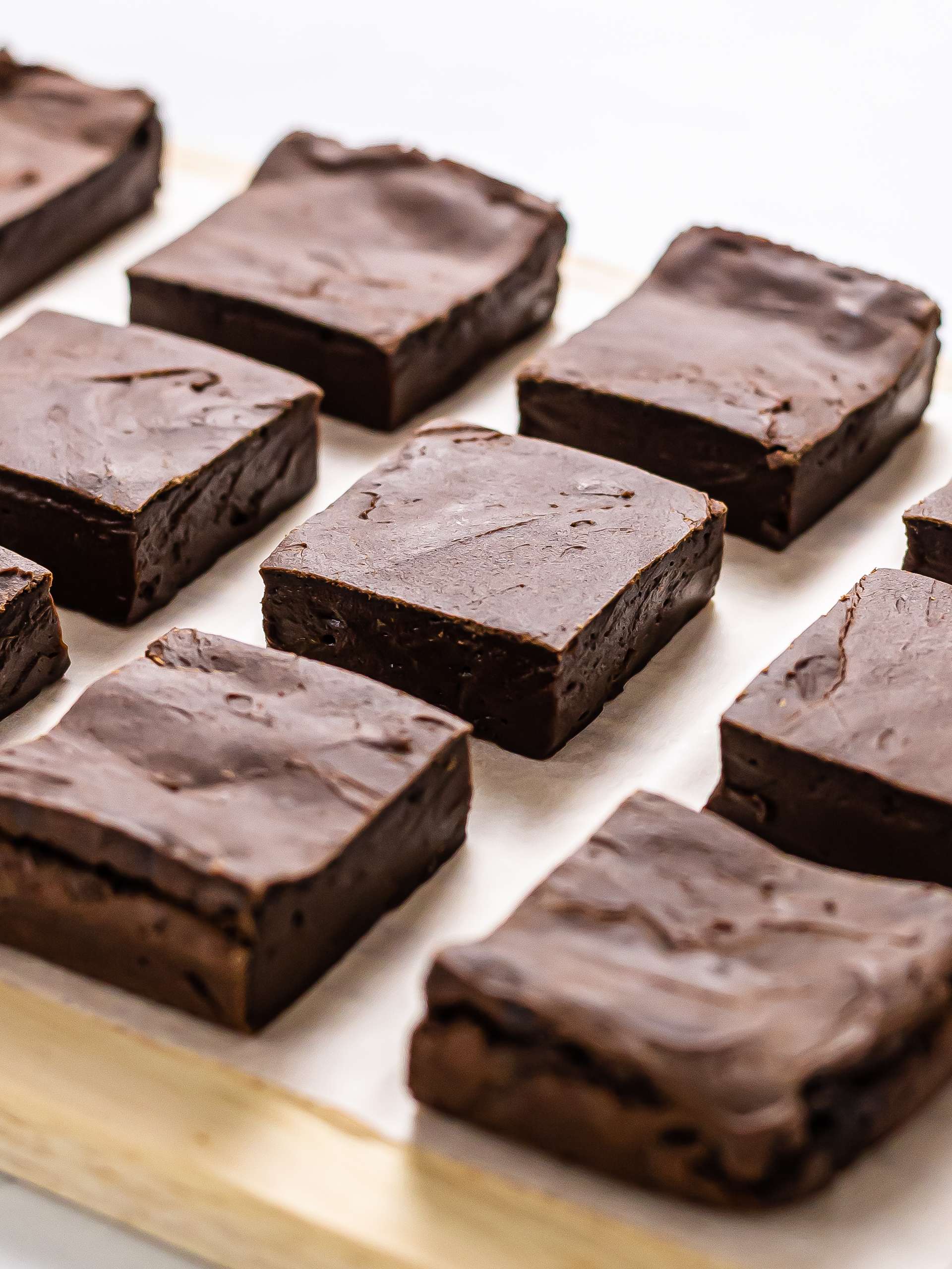 chocolate mochi brownies squares on a board