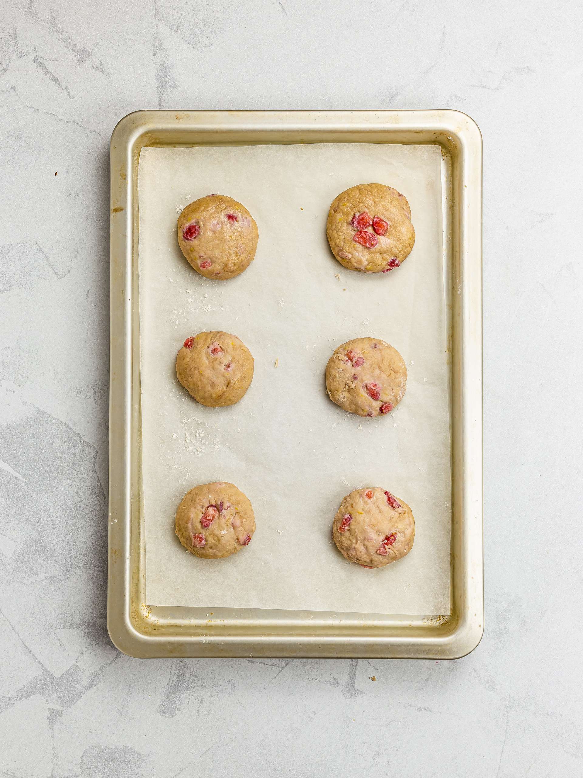 strawberry cheesecake cookies on a tray