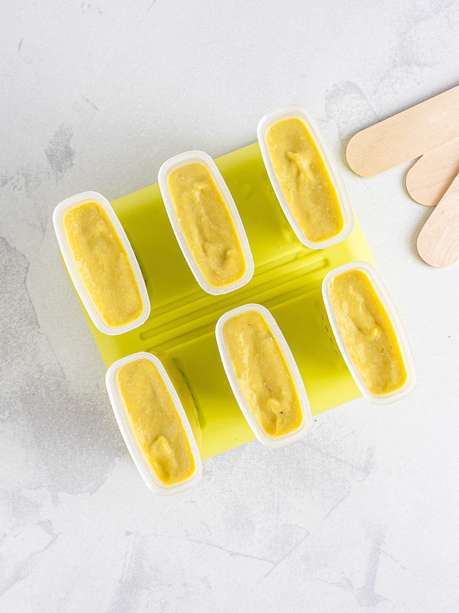 Mango malai kulfi in ice lolly moulds