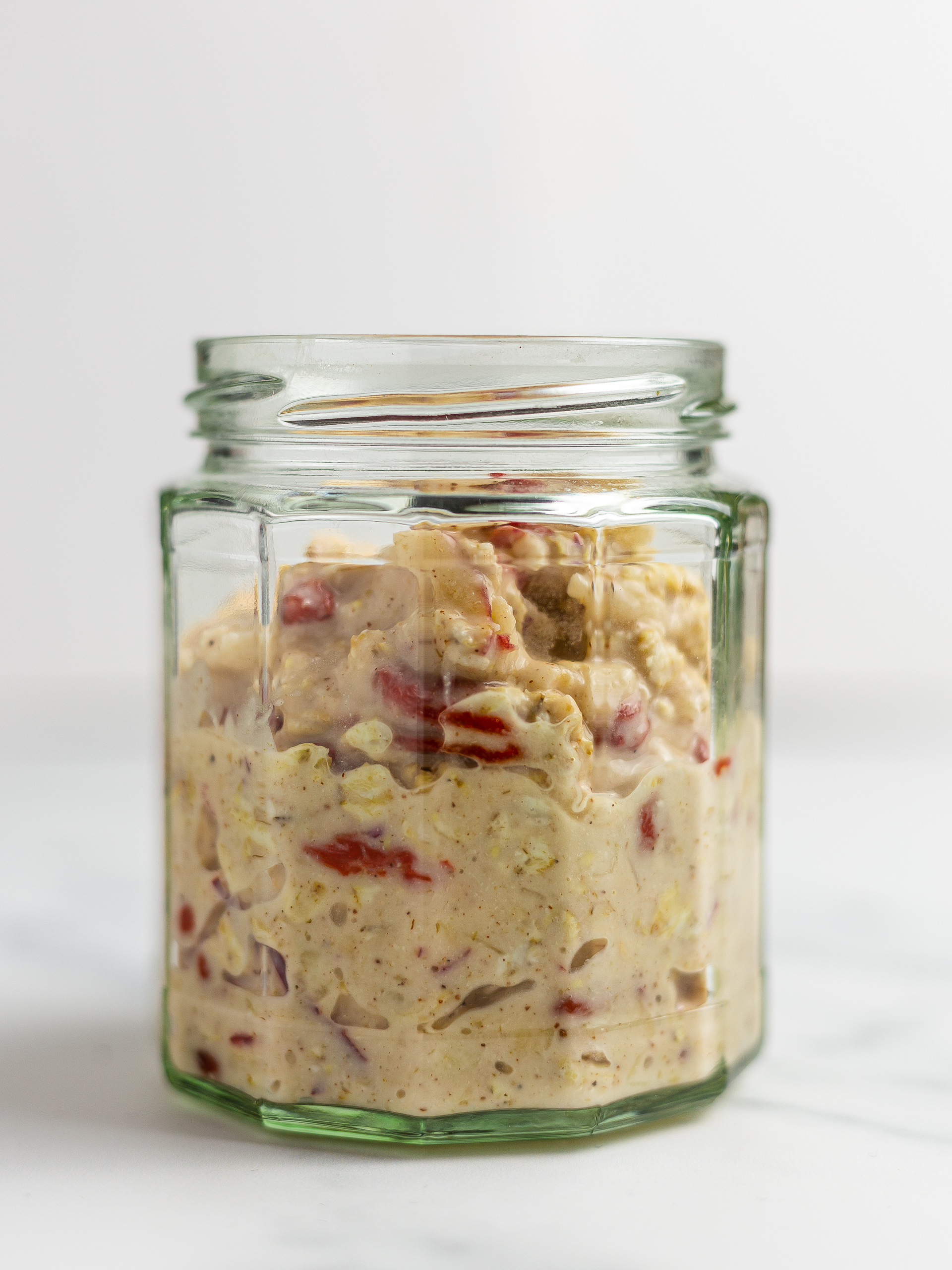 Goji and apple bircher muesli in a jar