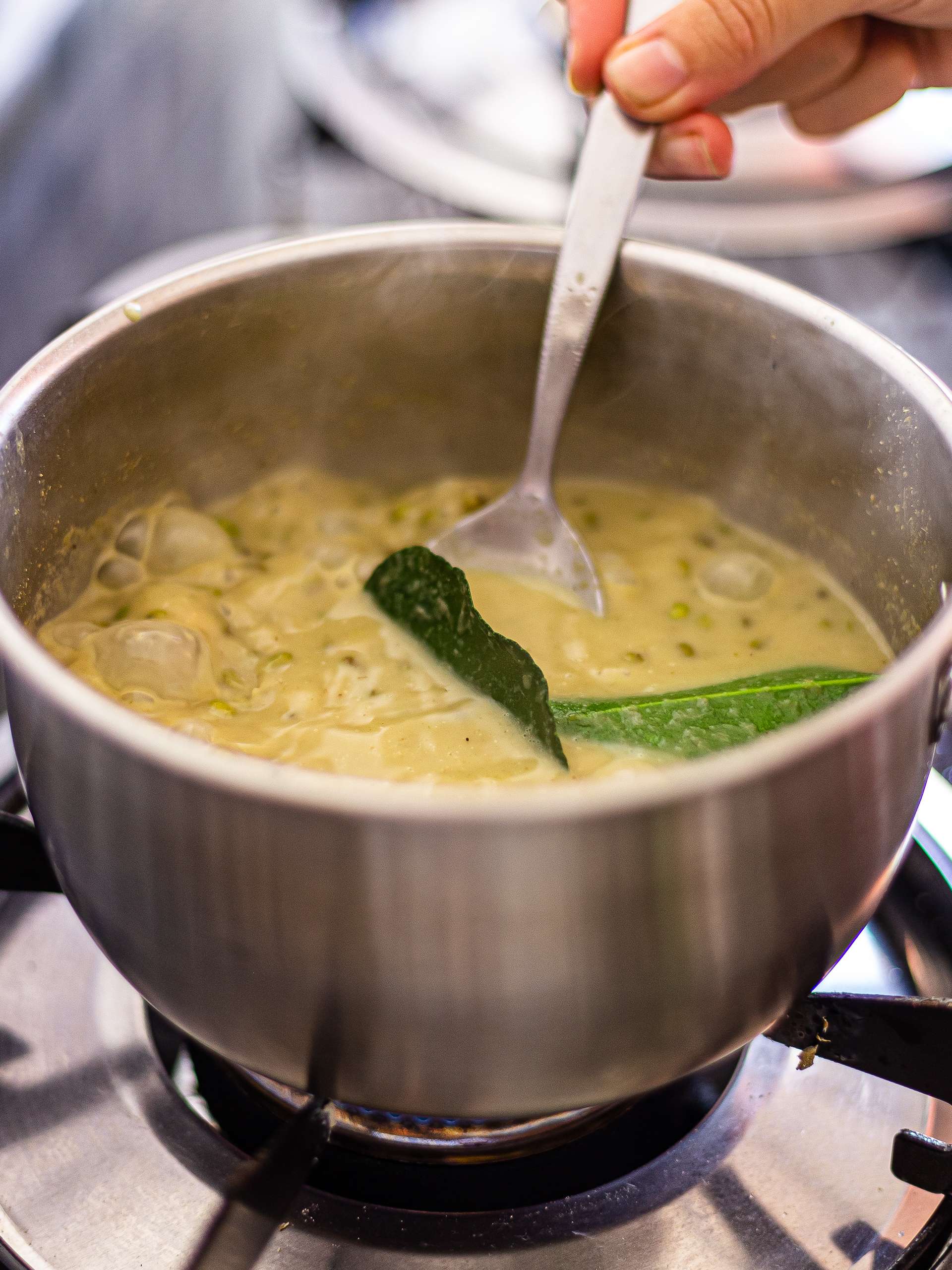 mung bean curry simmering in a pot