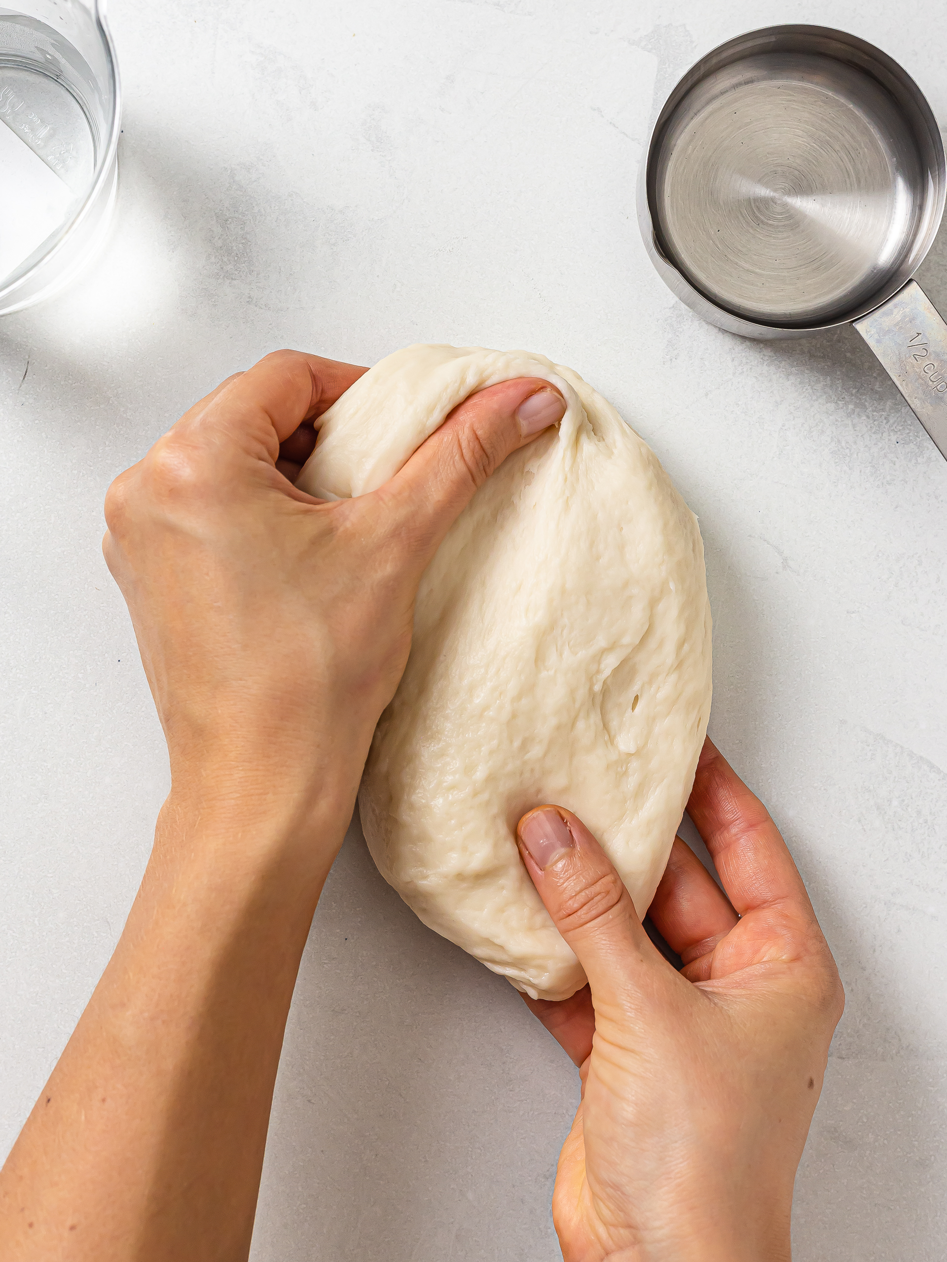 woman kneading hopia pastry dough