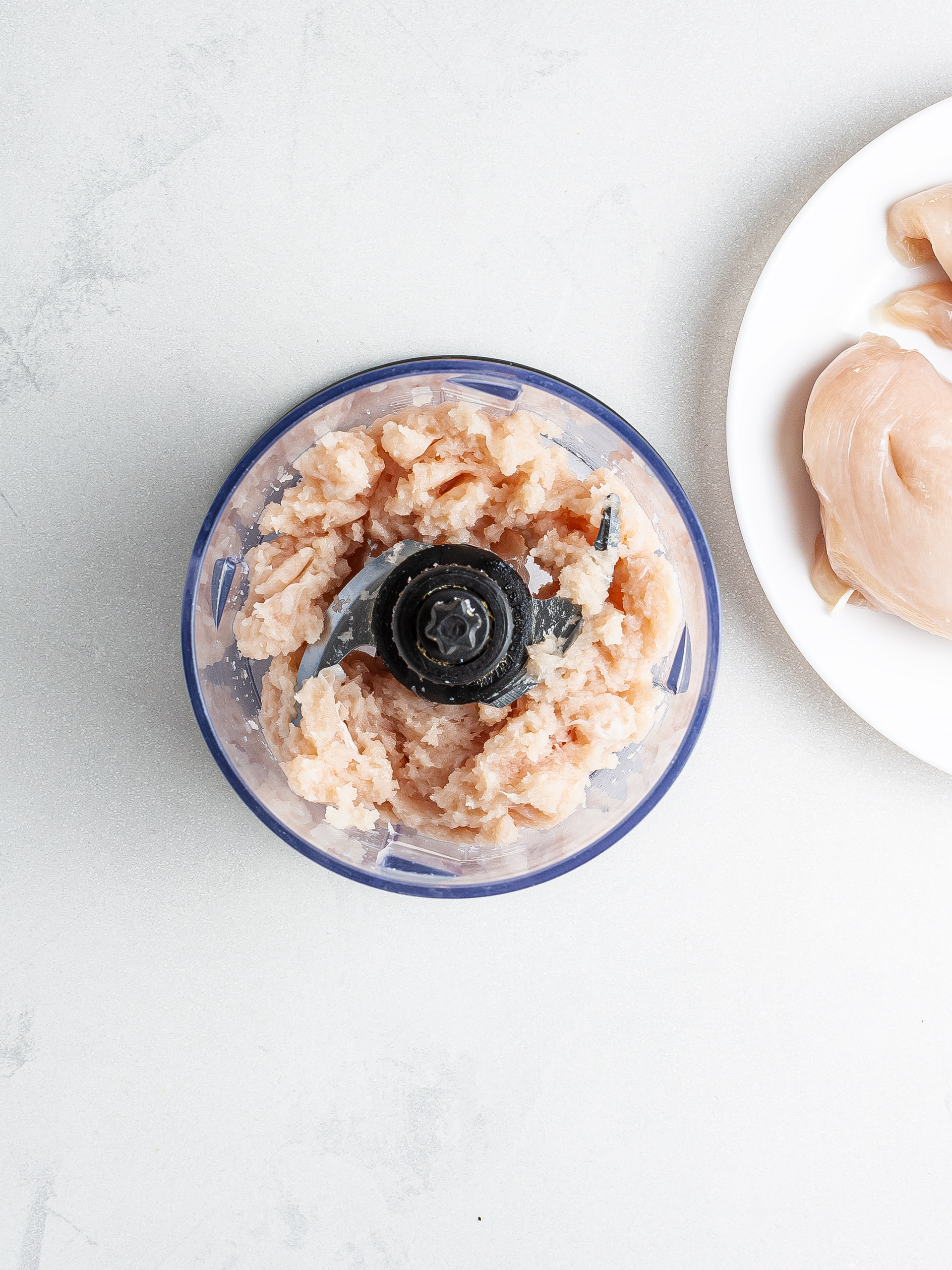 Minced chicken in a food processor