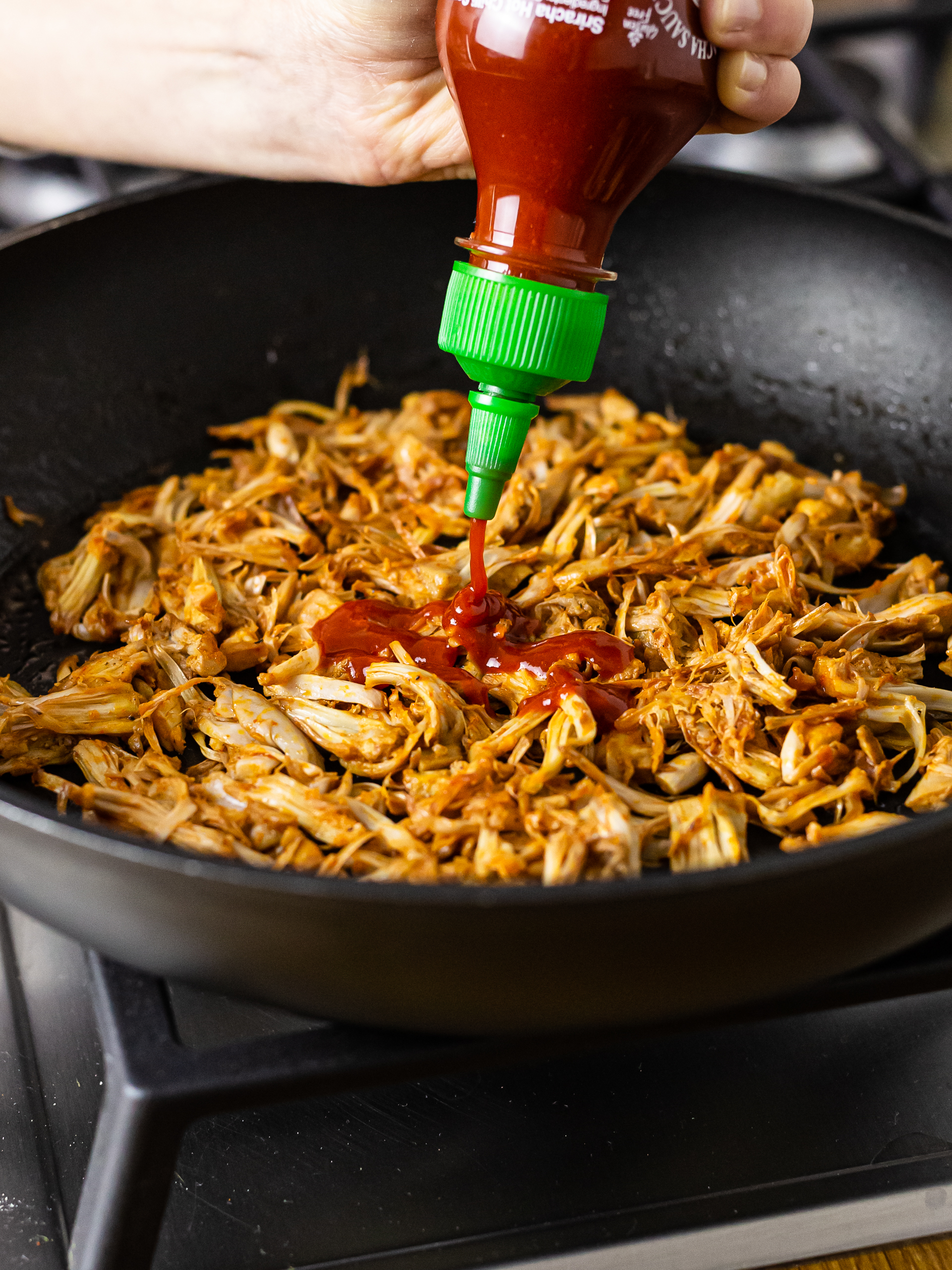 pulled jackfruit cooked with sriracha sauce
