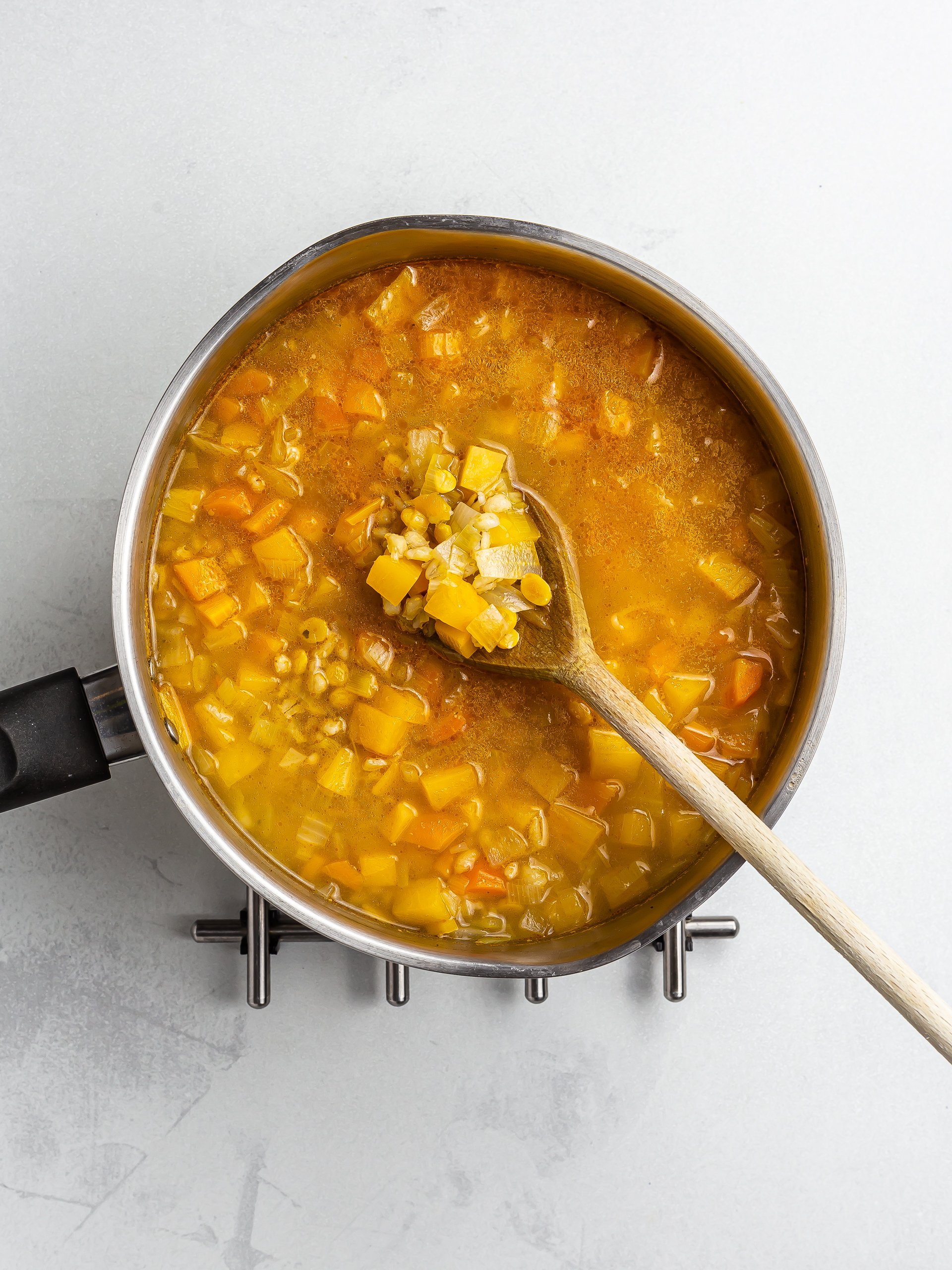 vegan scotch broth simmering a pot