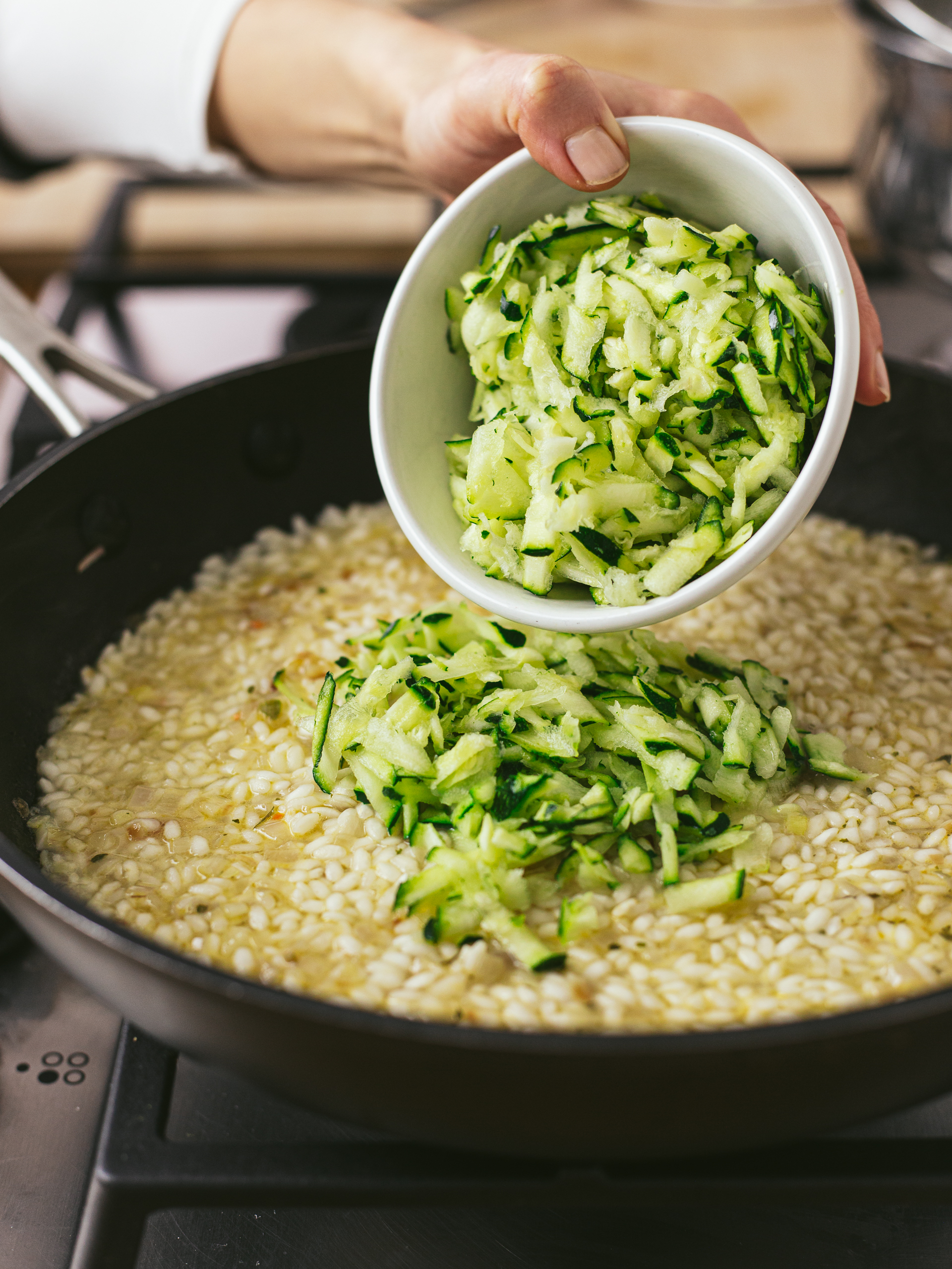 grated zucchini added to risotto