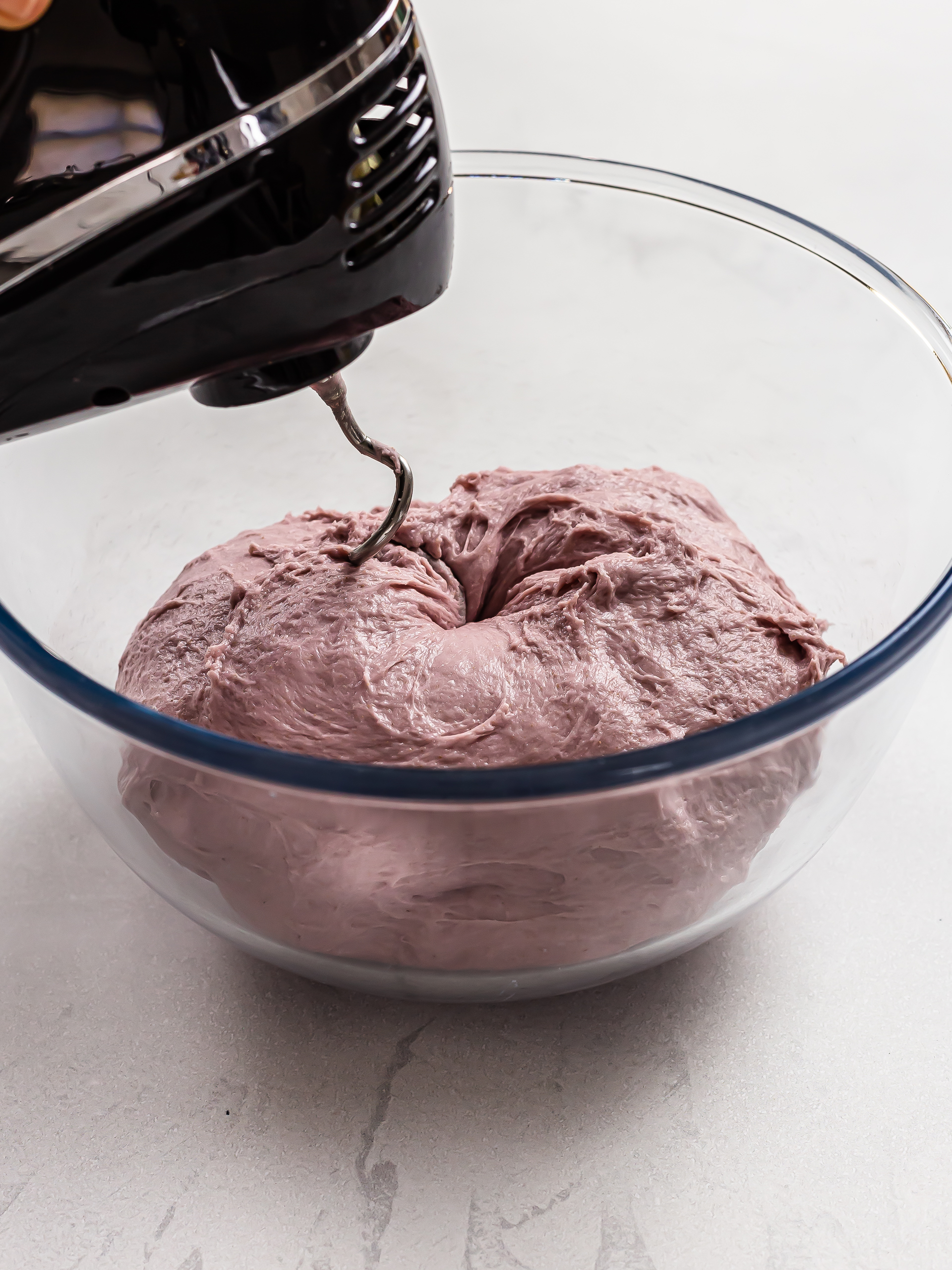 kneading ube bread dough with hooks