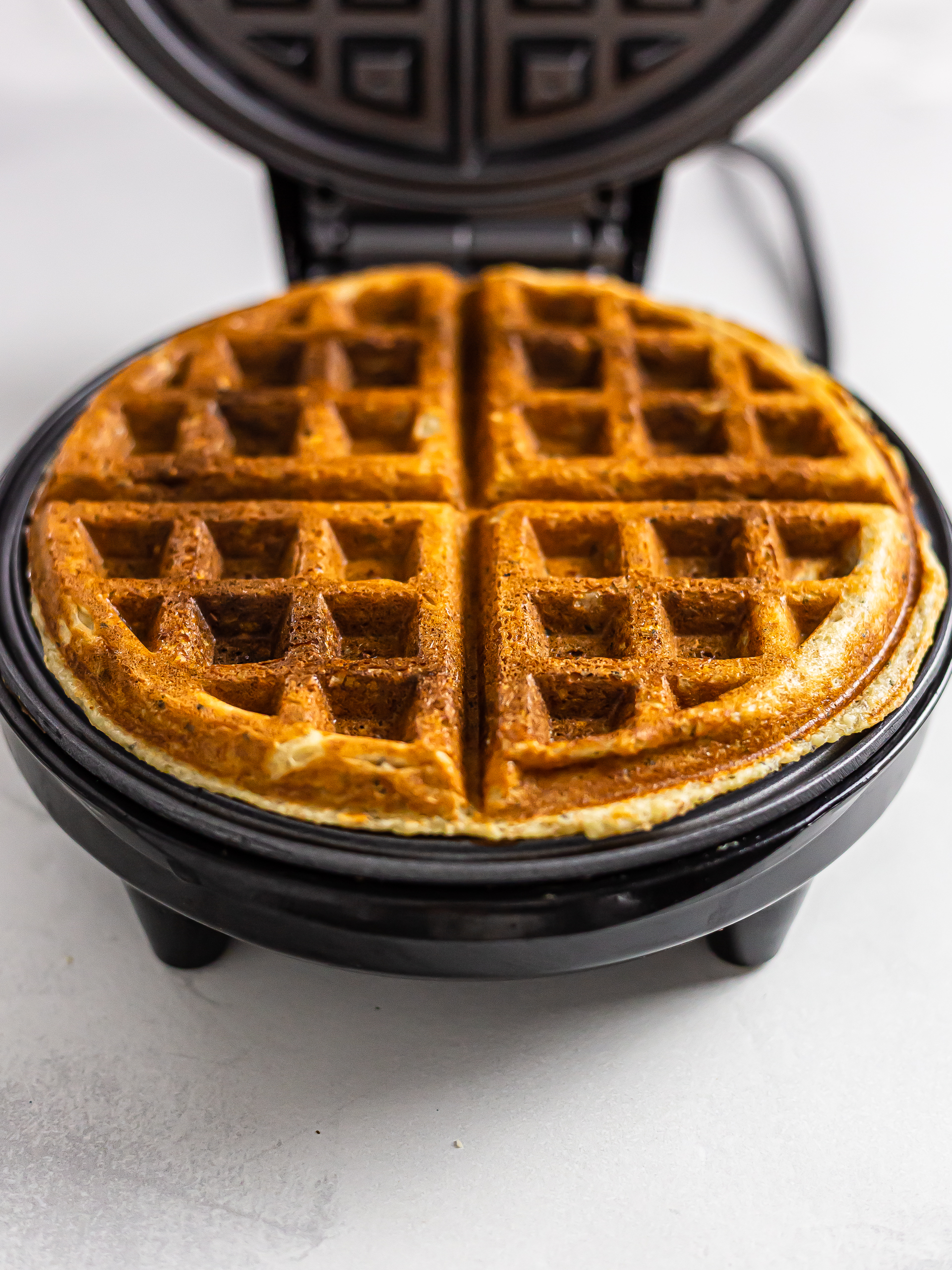 vegan protein waffles in a waffle machine