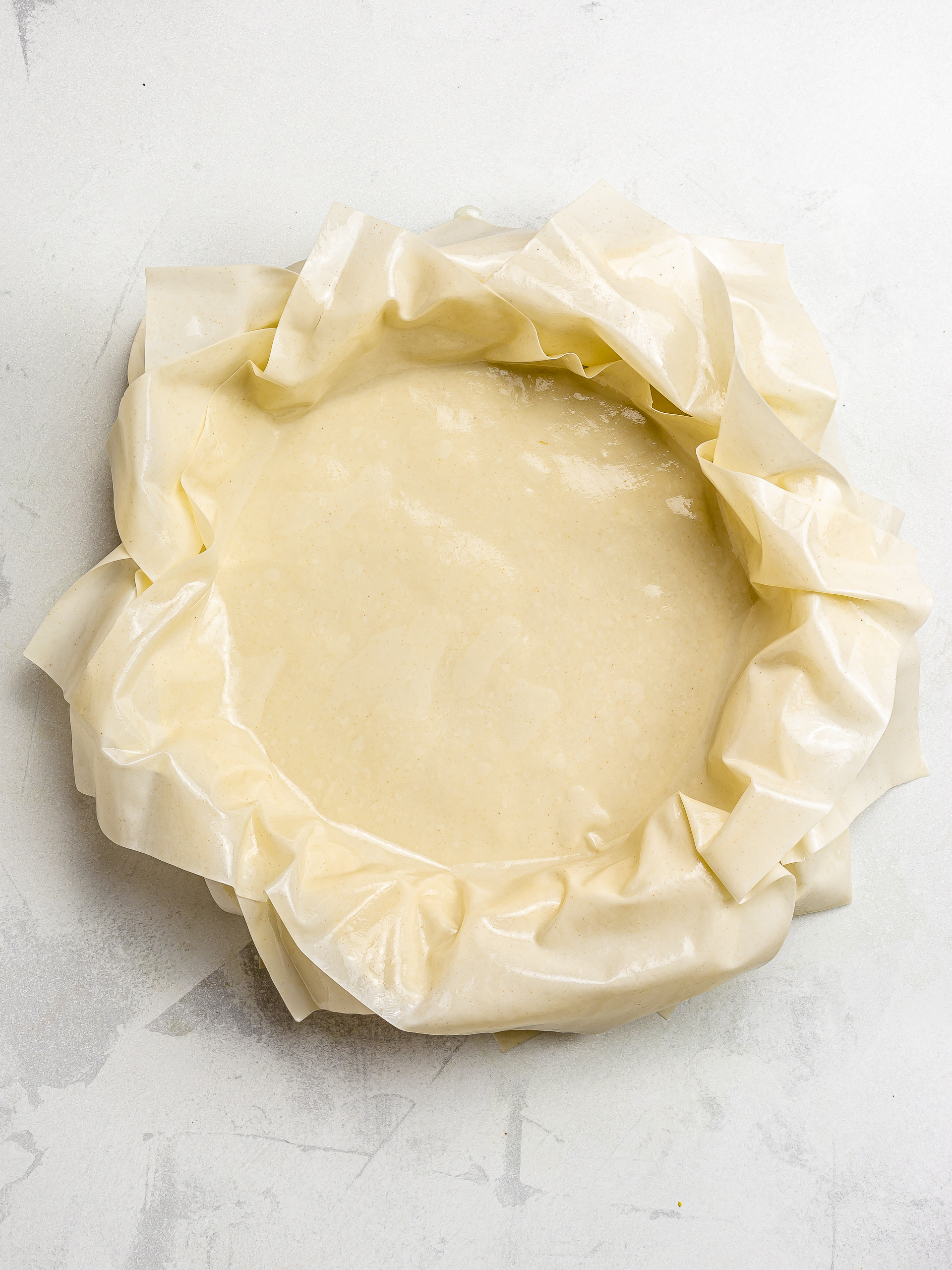 pie dish lined with filo sheets