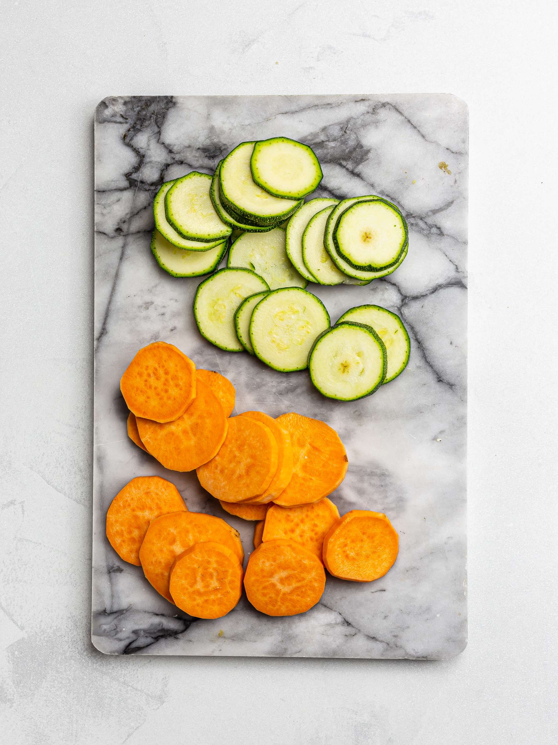 sliced courgettes and sweet potatoes