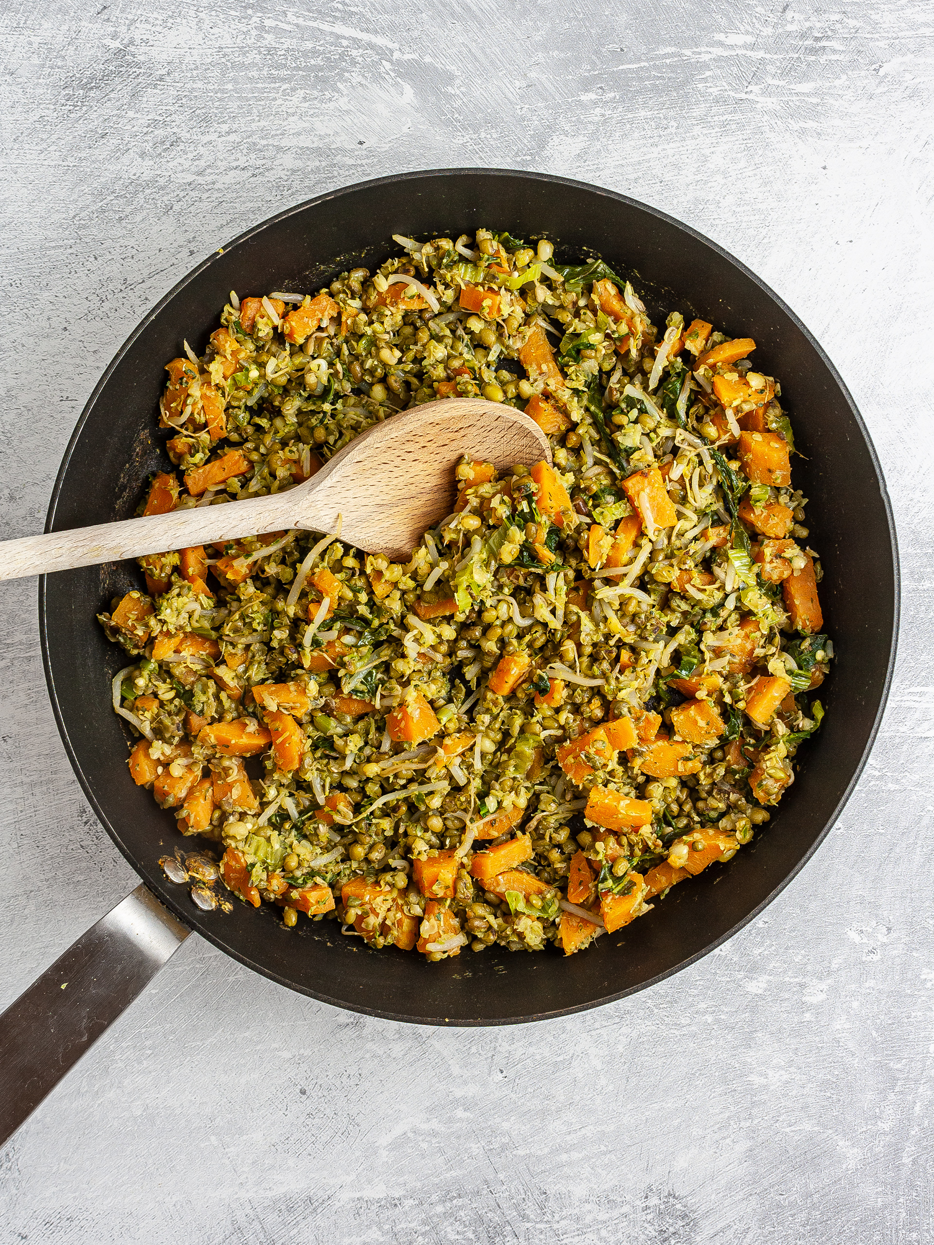 Cooked sweet potatoes, pak choi, and sprouts