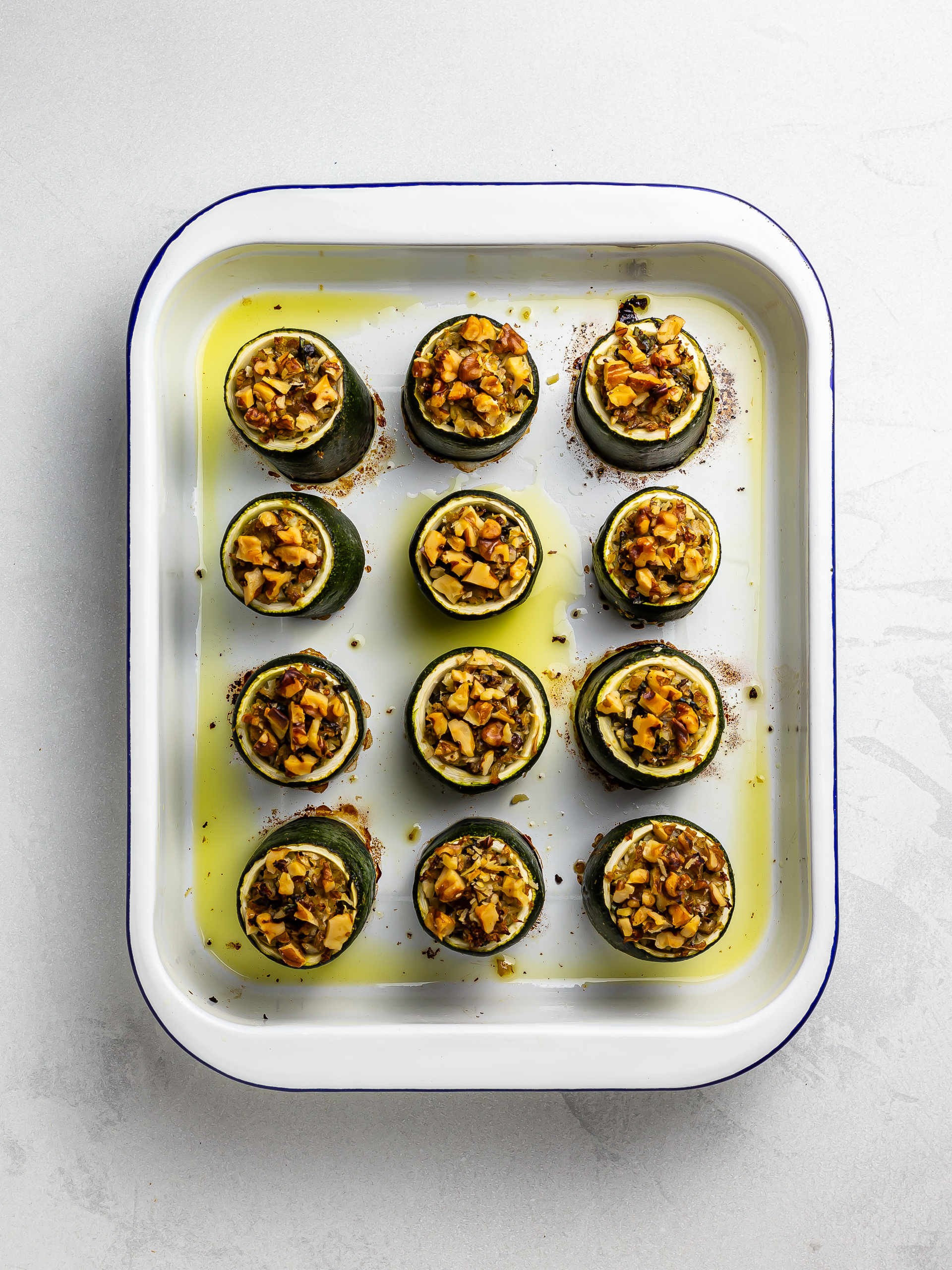 oven baked stuffed zucchini cups in a tray