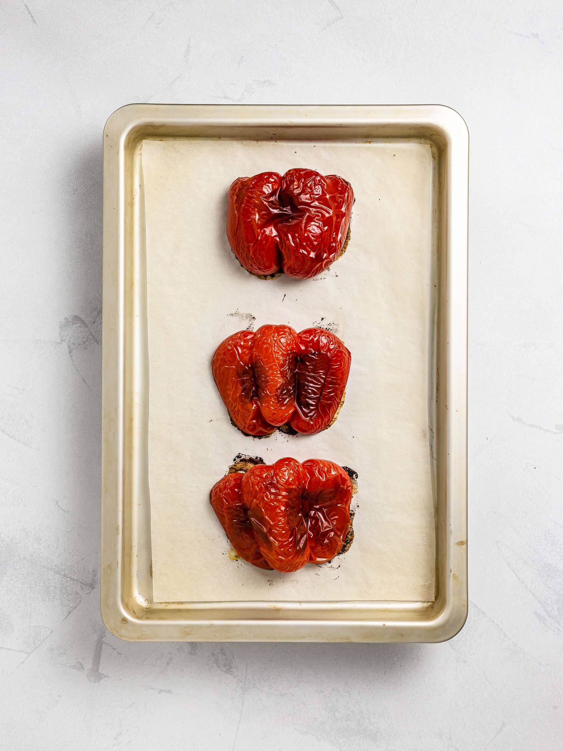 roasted red peppers on a tray