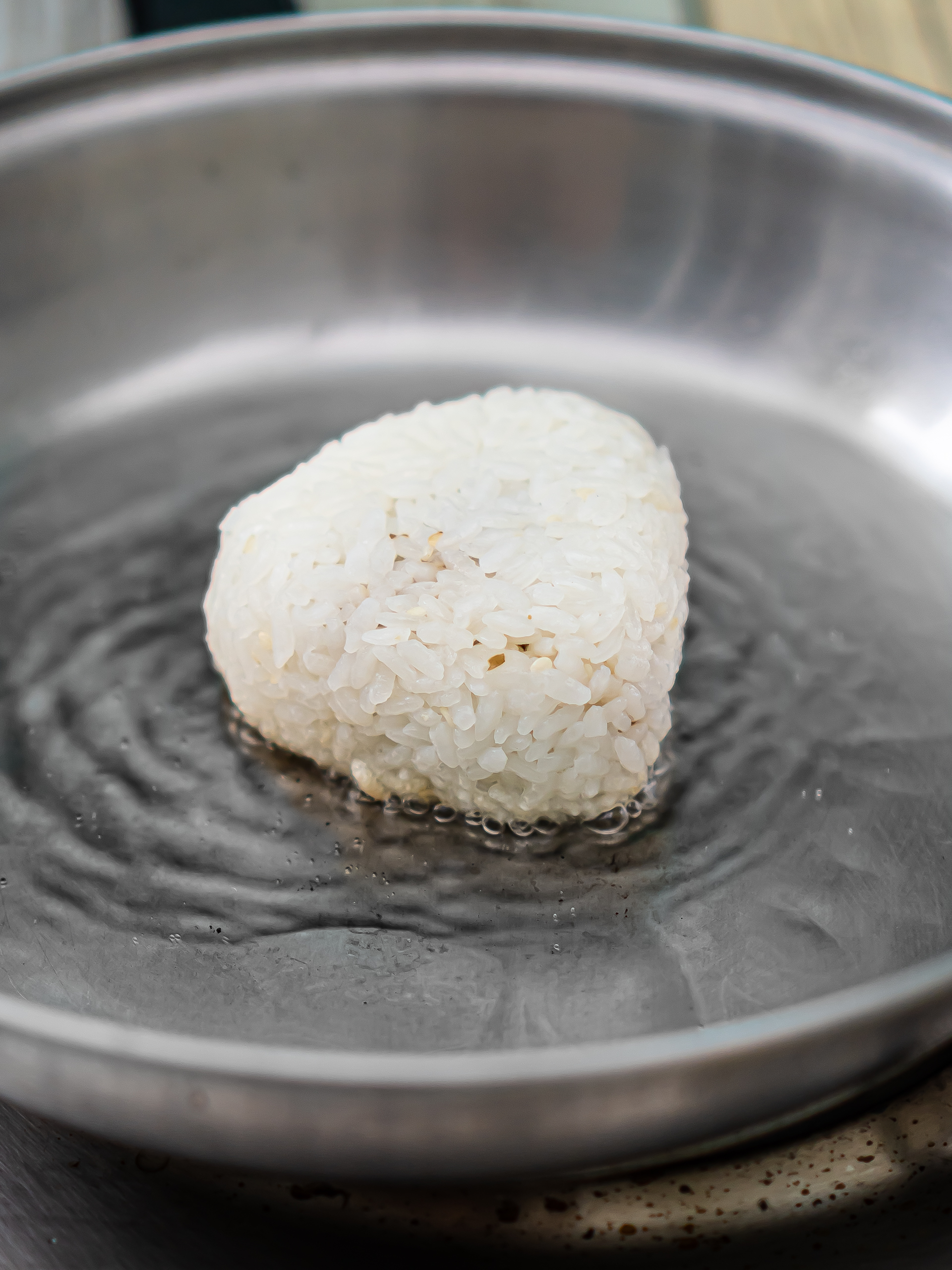 yaki onigiri rice balls cooking in oil