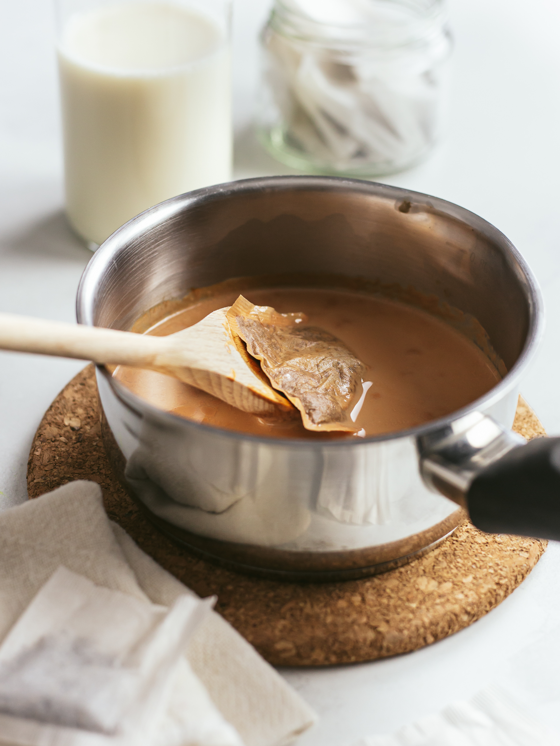 chai milk tea in a pot with chai tea bag