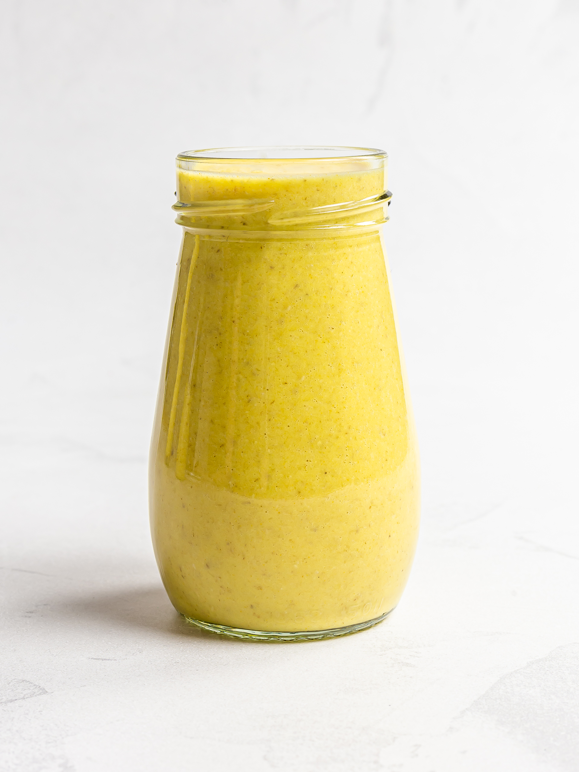 mango oat smoothie in a jar