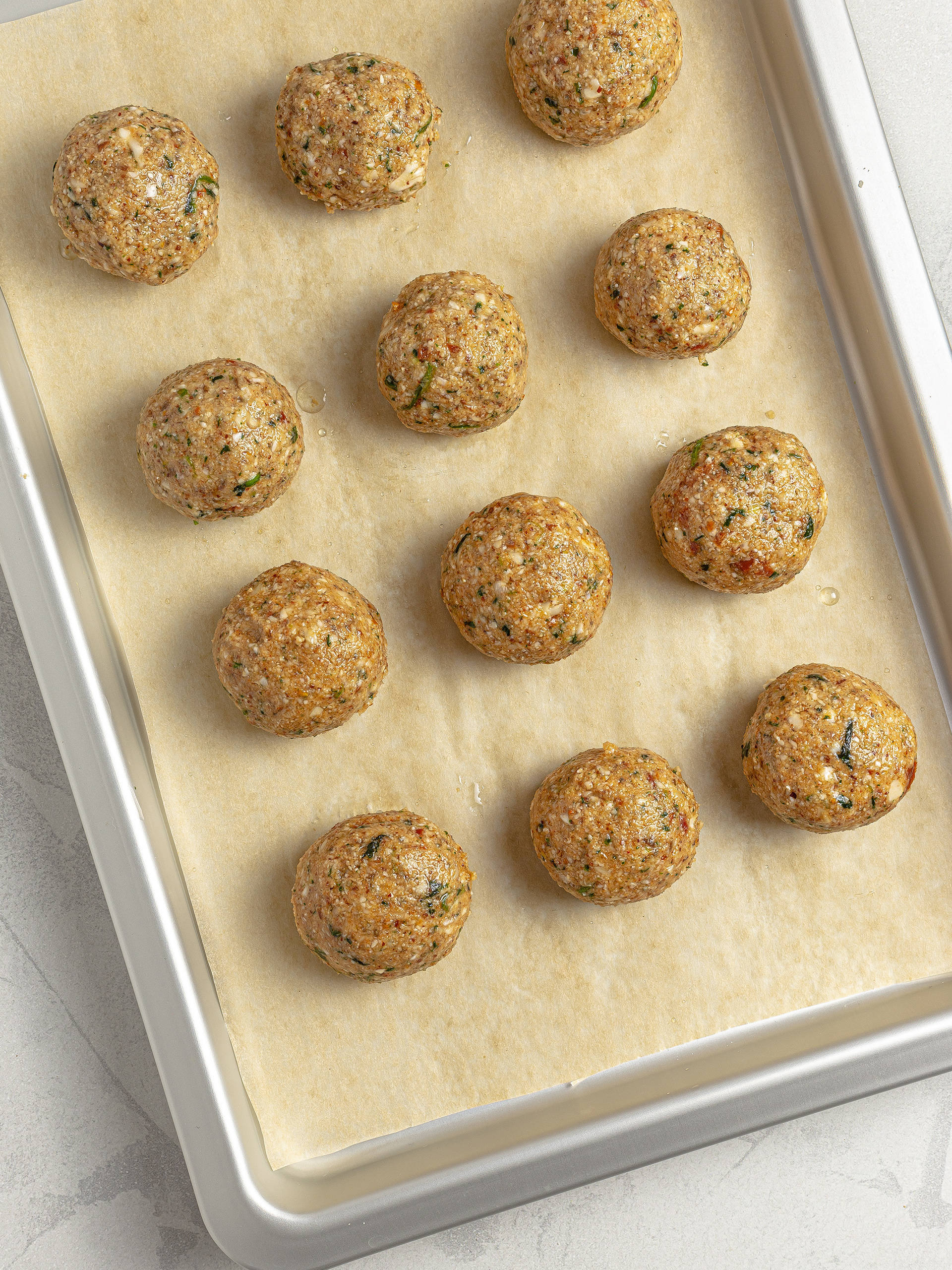 Shaped cauliflower falafels on a baking tray