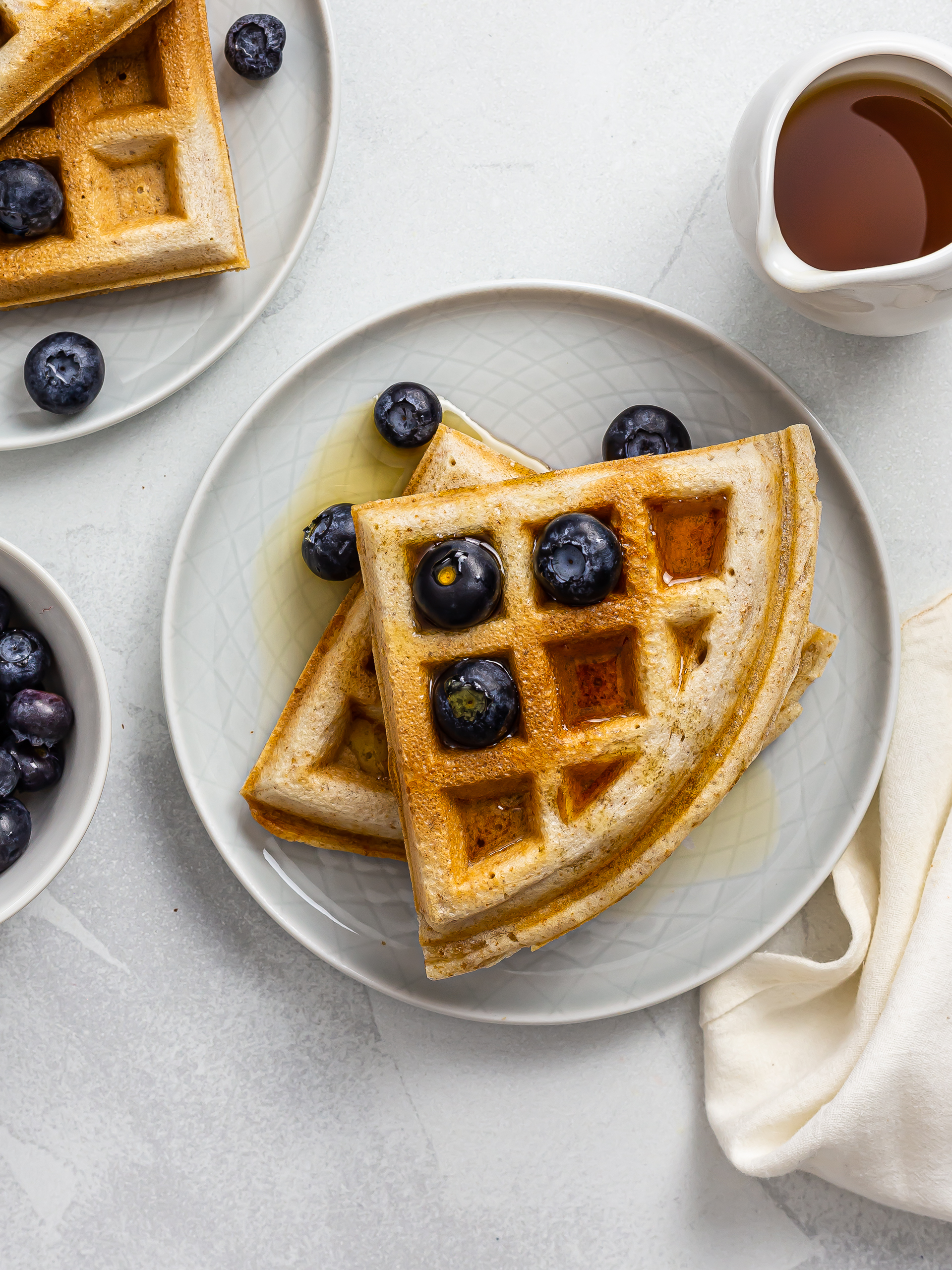 vegan sourdough waffles with berries on a plate