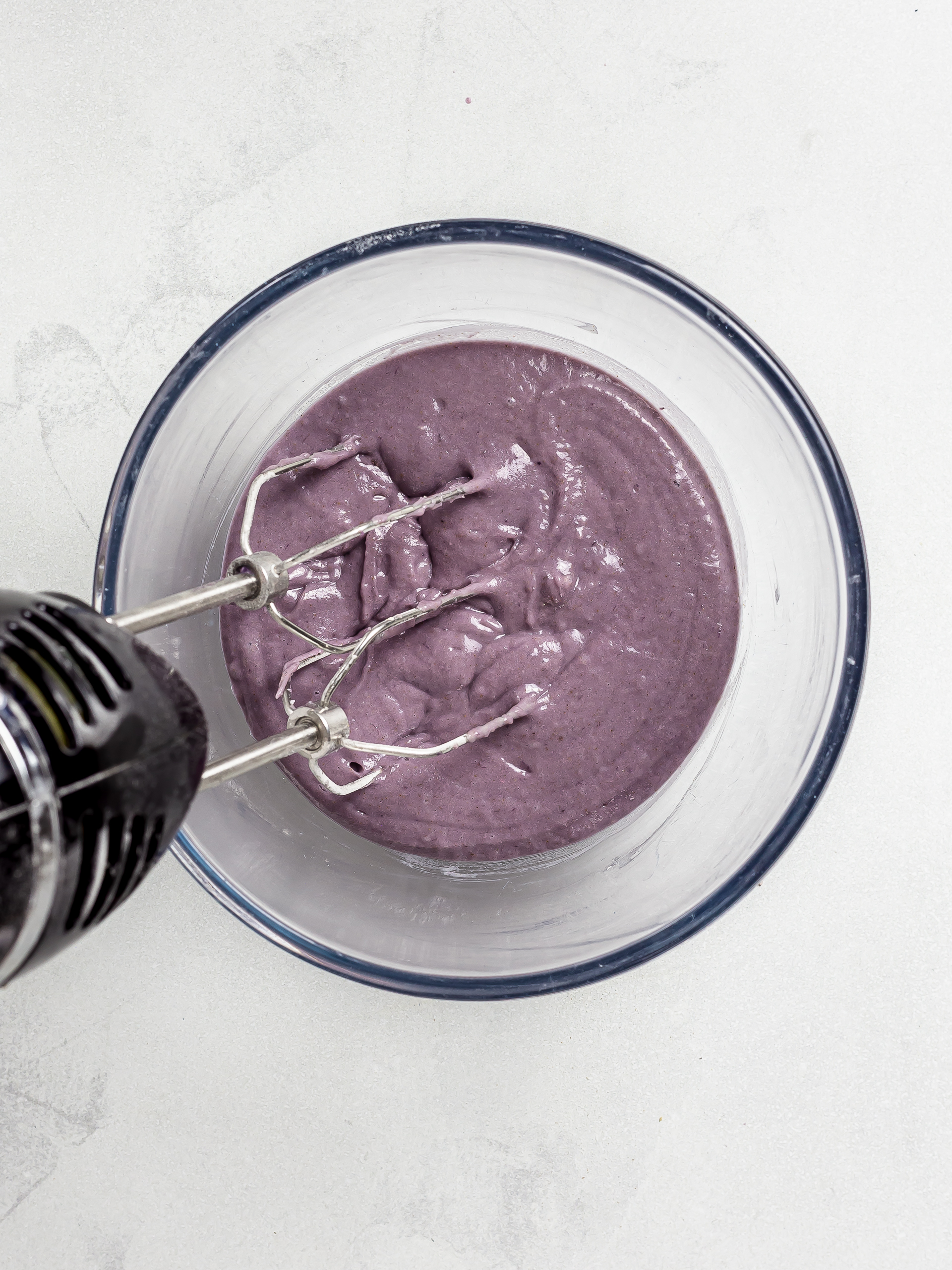 ube cupcake batter in a bowl