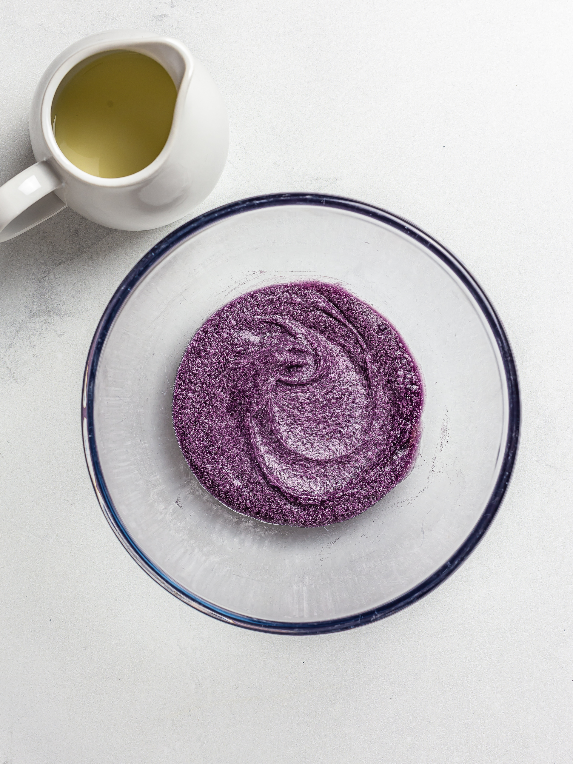 ube spread beaten with sugar and a jug of milk