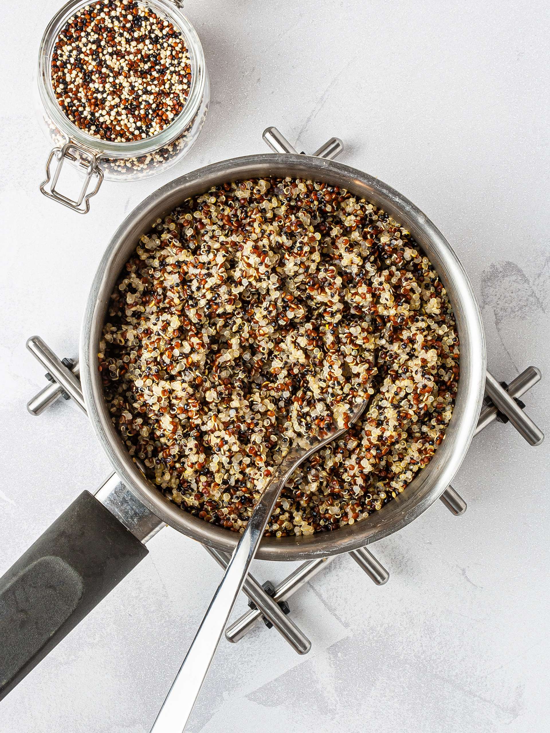 Cooked quinoa in a pan.