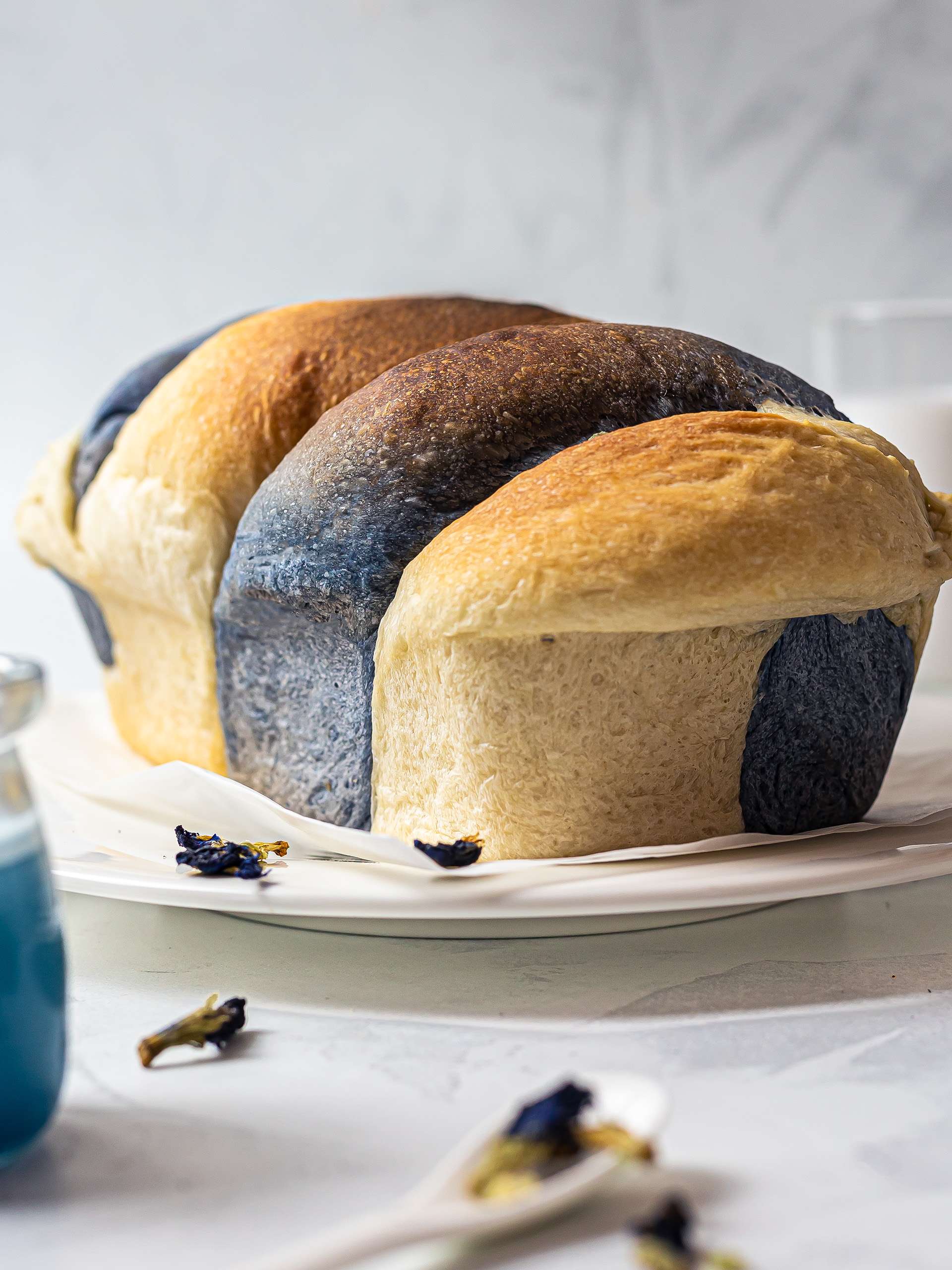 baked braided blue butterfly pea bread loaf