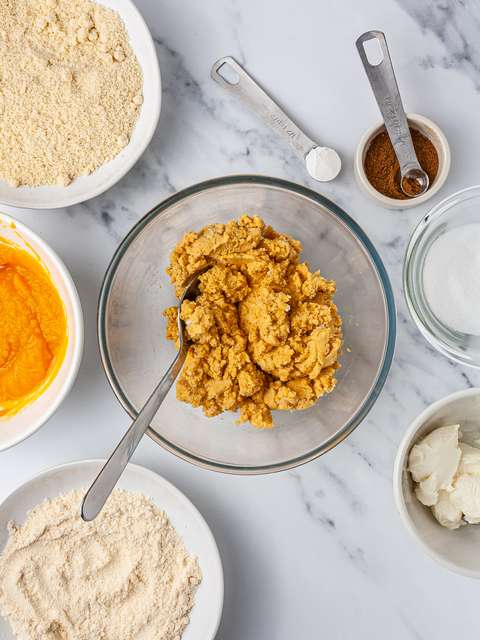 Keto pumpkin scones dough made with almond flour, coconut flour, cream cheese, pureed pumpkin and erythritol.
