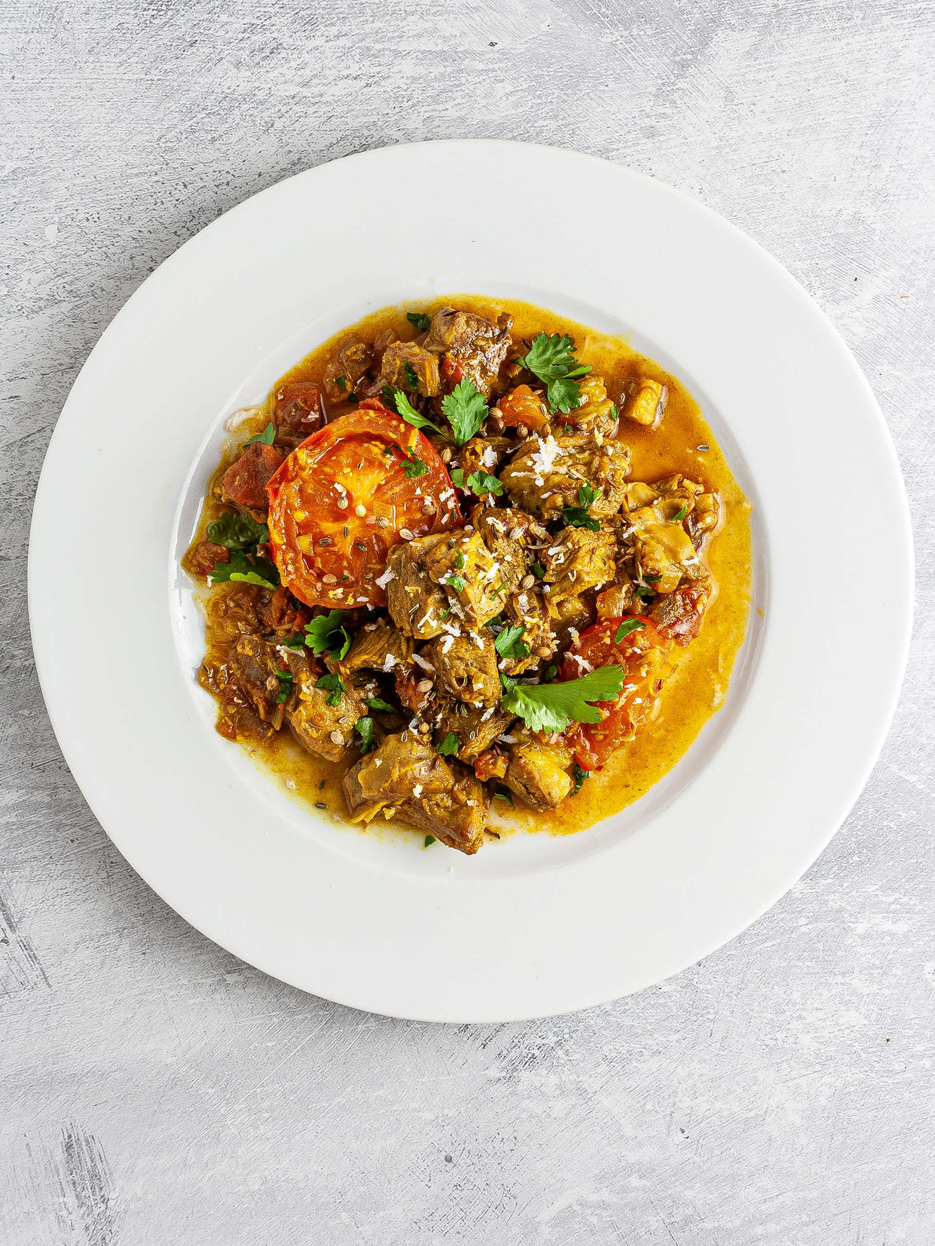 Lamb chettinad served with coconut and coriander