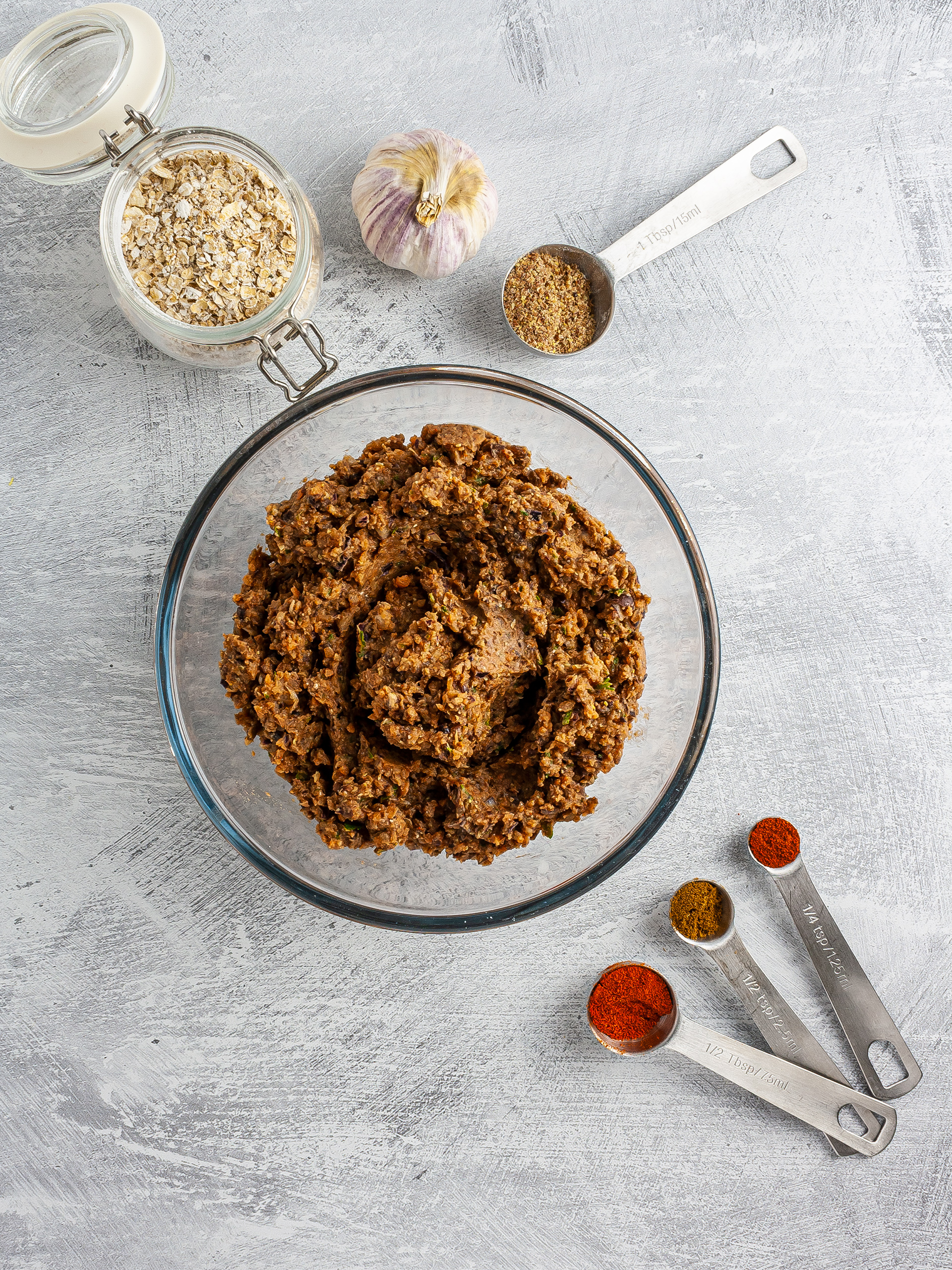 Burger dough with oats, flaxseeds, spices, and garlic